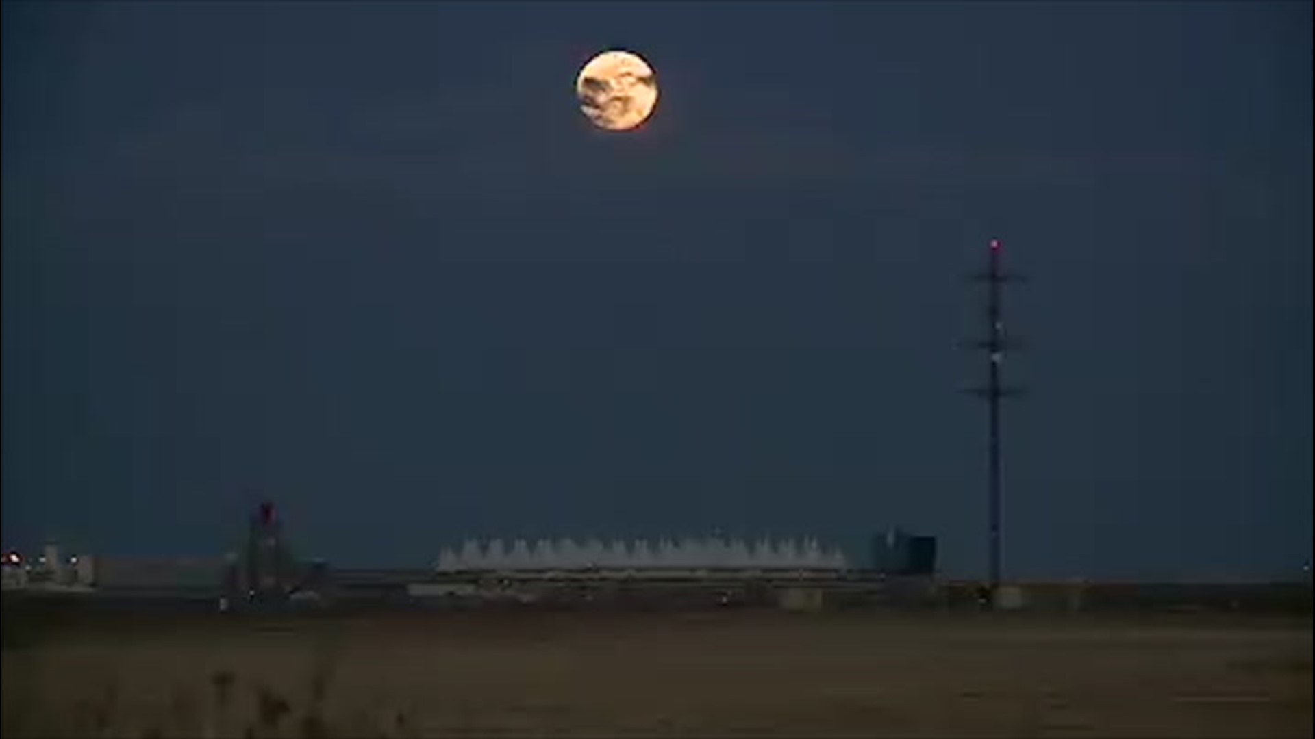 A supermoon was seen rising over Denver International Airport on April 7.
