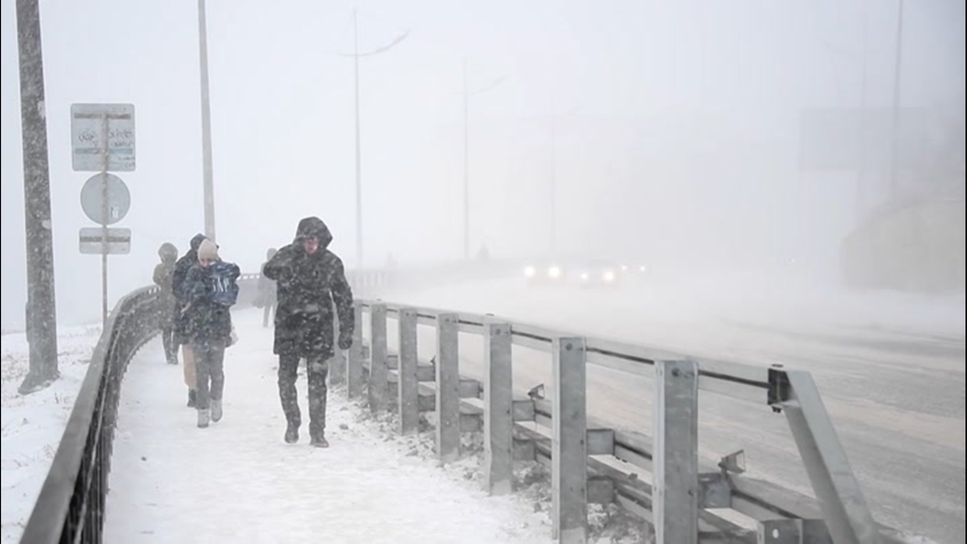 Drivers navigated snowy roads on Jan. 28, as a winter storm hit Vladivostok, Russia.