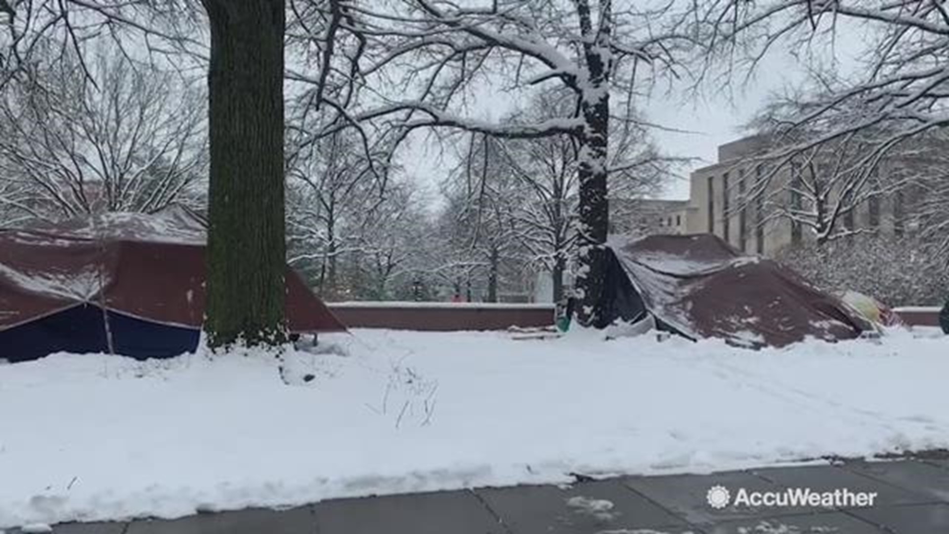 This homeless tent camp in Washington, DC has been buried by snow from the winter storm on Jan. 13.