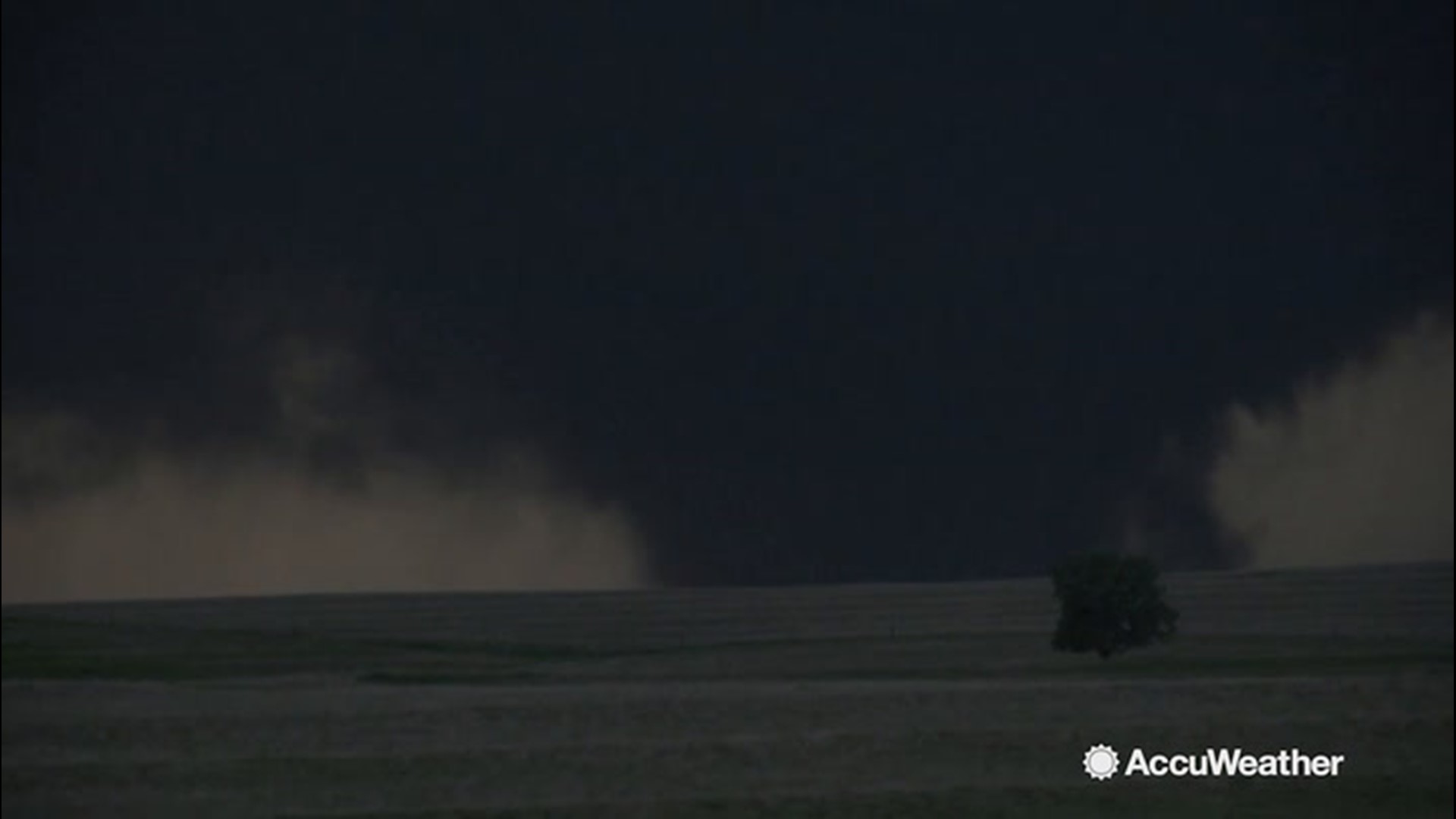 This ominous night-time tornado was spotted swirling near Slapout, Oklahoma just outside the Texas border on May 23 by storm chaser Blake Naftel.