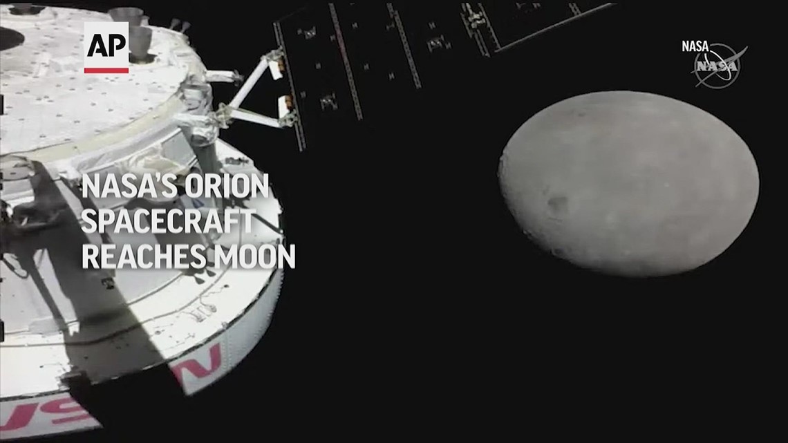 NASA’s Orion spacecraft flies by moon, sends back image of distant Earth