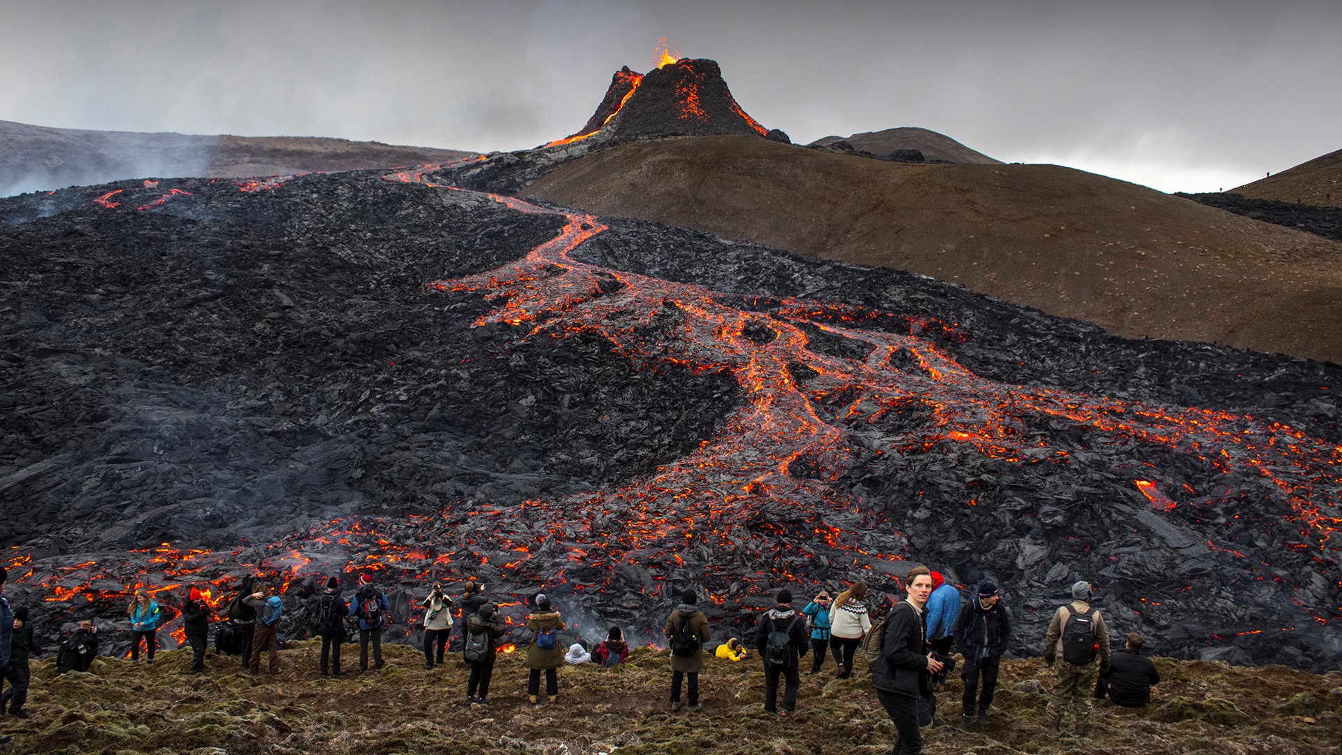Iceland's latest volcano eruption is quickly attracting crowds of people hoping to get close to the gentle lava flows.