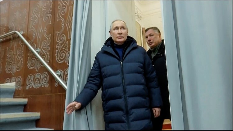 Facing arrest warrant, Putin visits occupied city of Mariupol