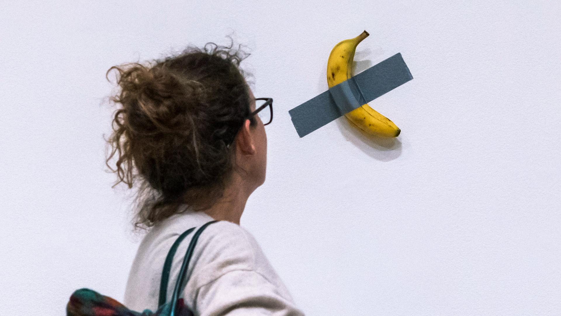 Who bought the duct tape banana? Art auction fetches millions ...