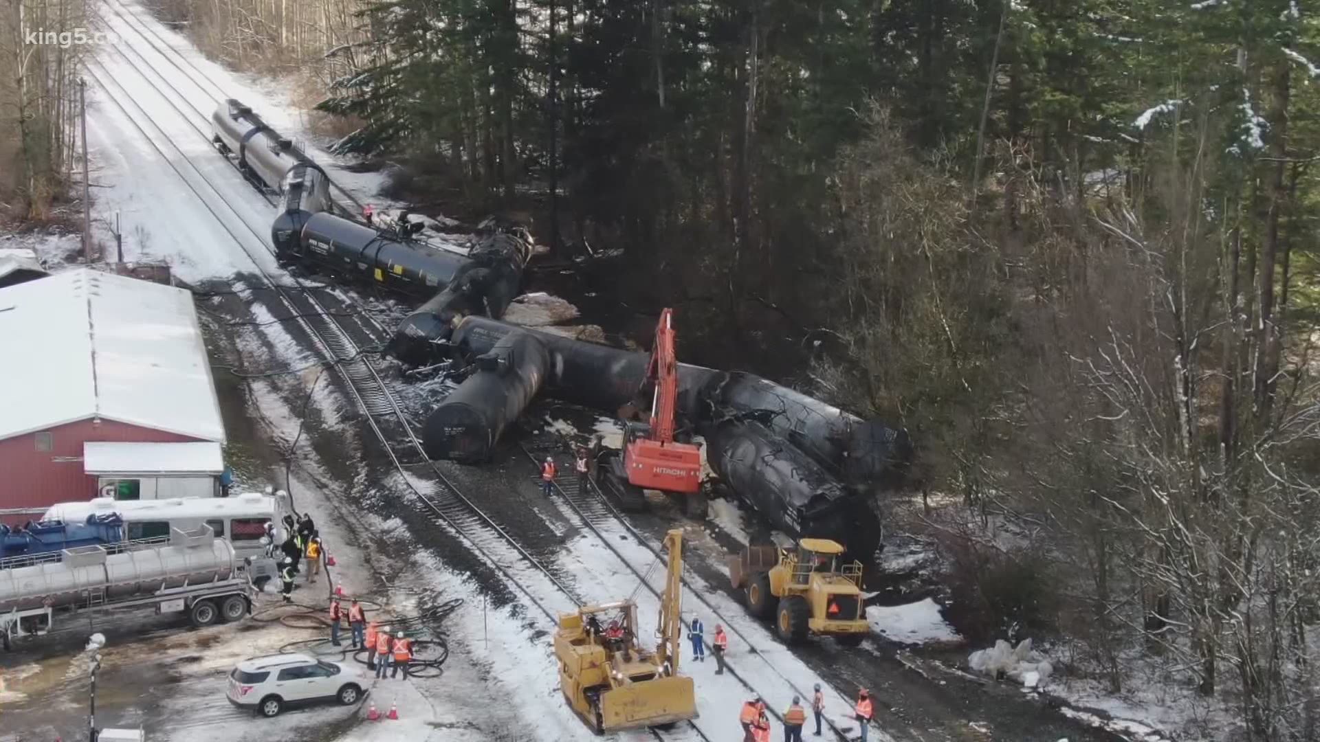 Crews are continuing to work on cleanup after six tanker train cars derailed in the Custer area of Whatcom County and caught fire Tuesday. No one was injured.