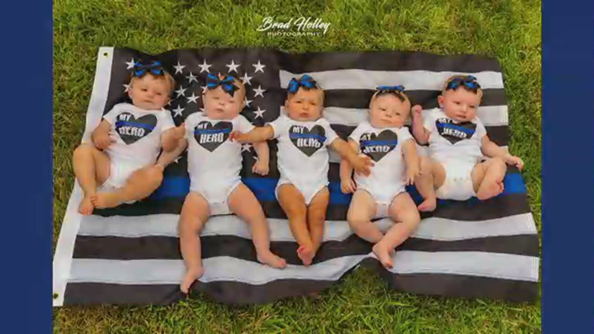 Four deputies posed with their newborn daughters and even the sheriff got in on the action with his new granddaughter.