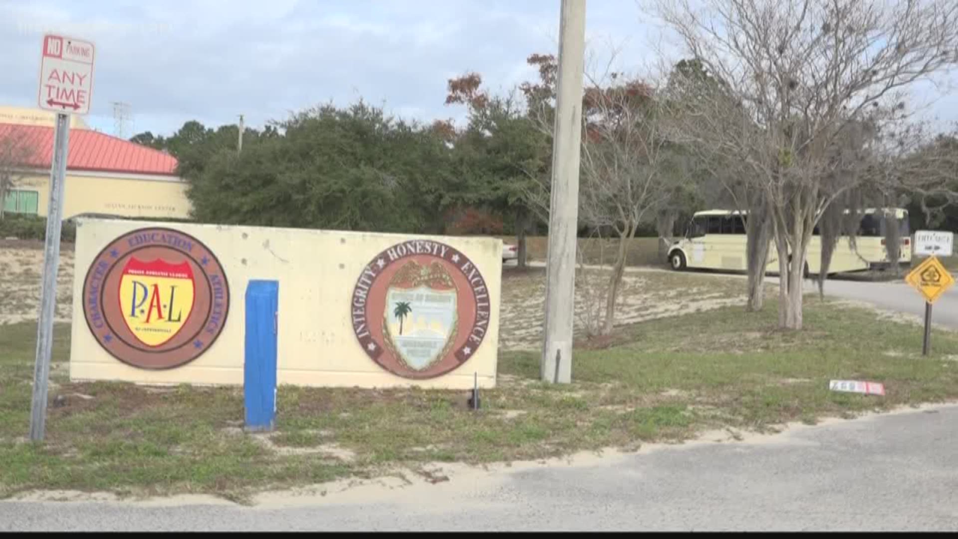 Members of the Jacksonville P.A.L. arrived at their facility Friday to find a racial slur, curse words and obscene image spray-painted on one of their buses.