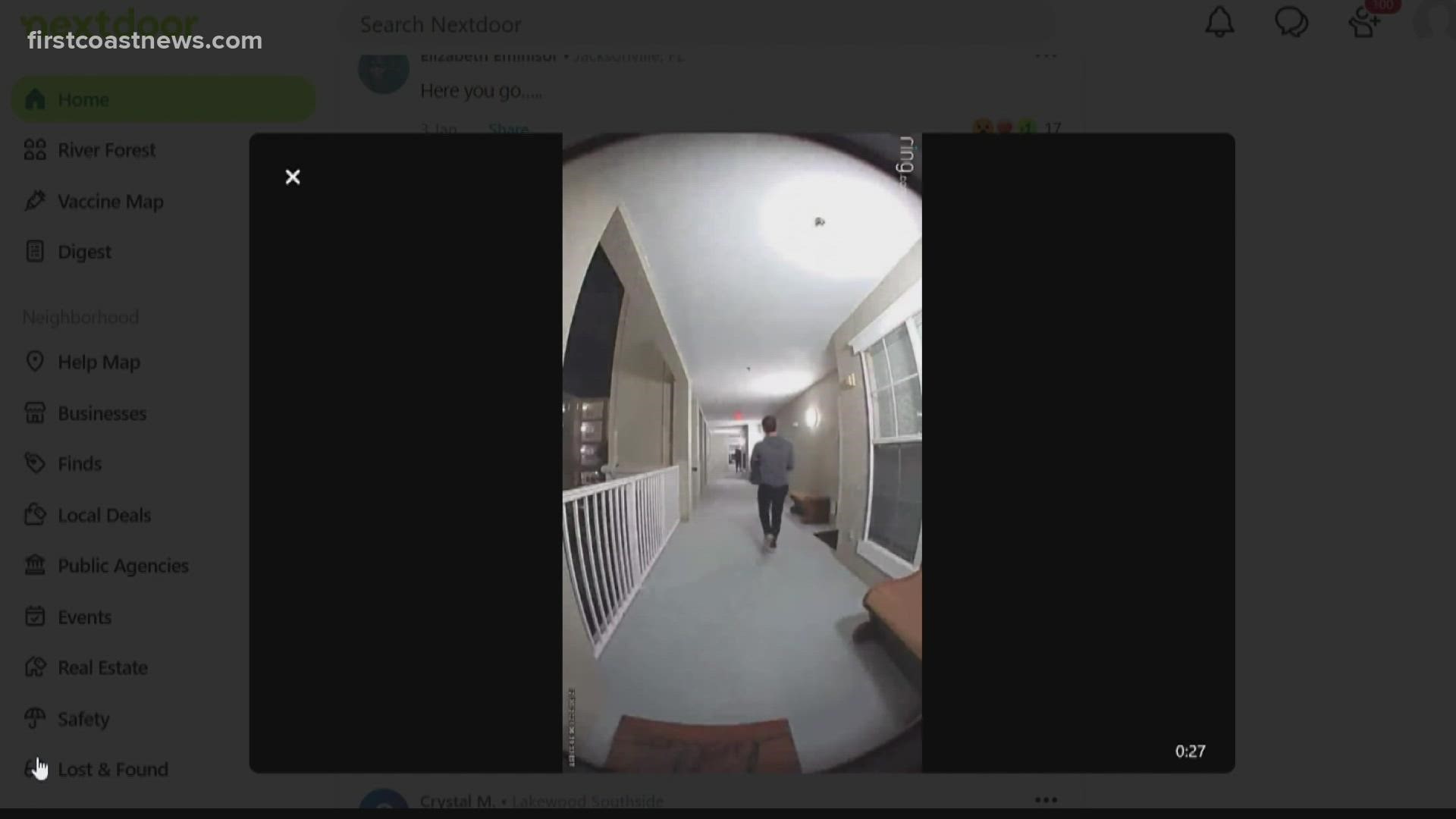 A ring Camera video shows two men walking up to the door and taking the package.