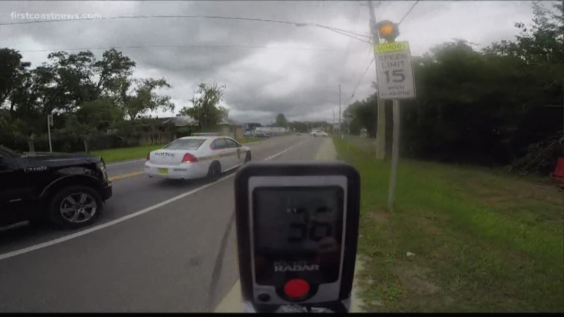 An officer with the Jacksonville Sheriff's Office was caught on camera apparently speeding into a school zone. It's caught fire online, but we wanted to know more about the video, the man who shot it and where it was shot.