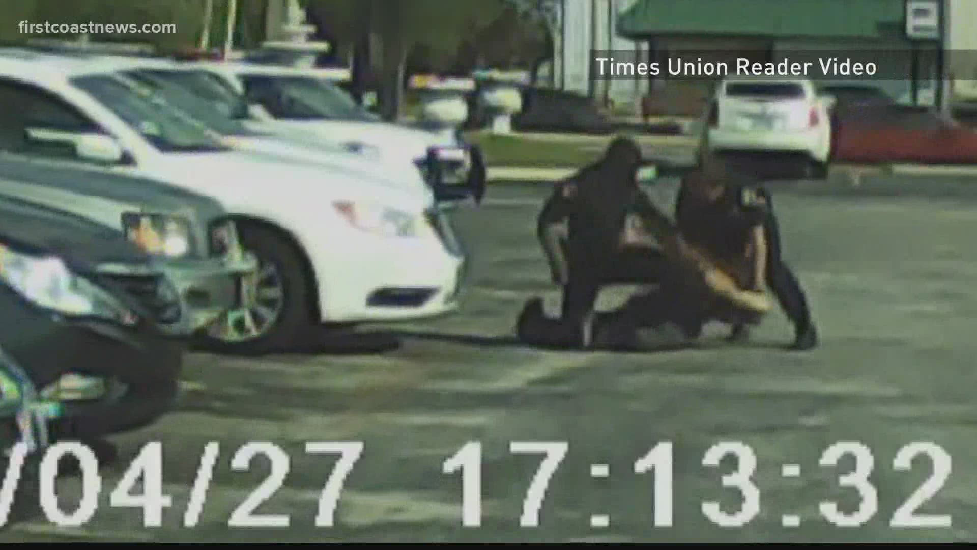 A woman twice beaten by police while handcuffed has settled her lawsuit against the city of Jacksonville, according to her lawyer.