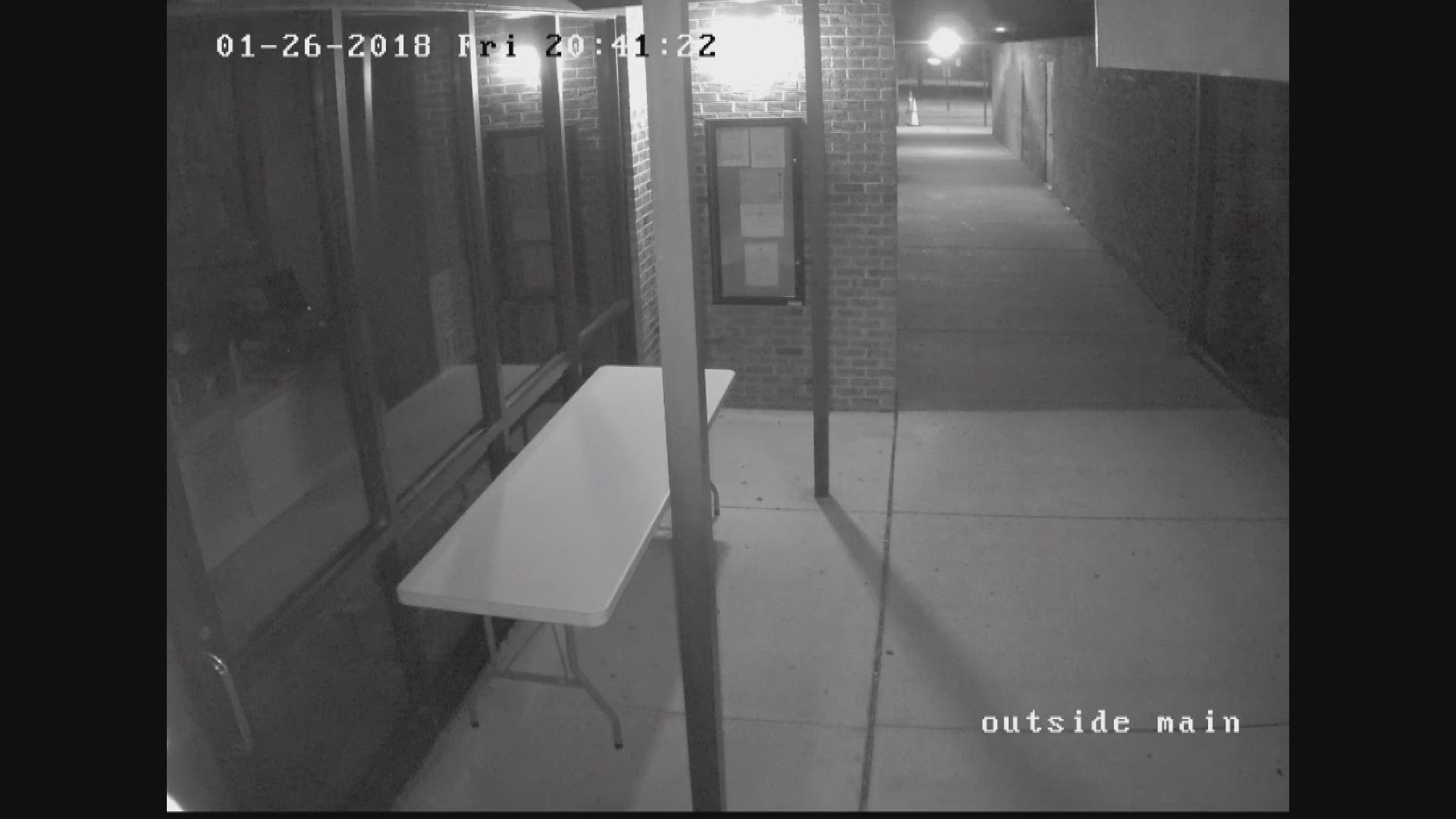 WATCH: Surveillance video of principal reportedly stealing cash from vault