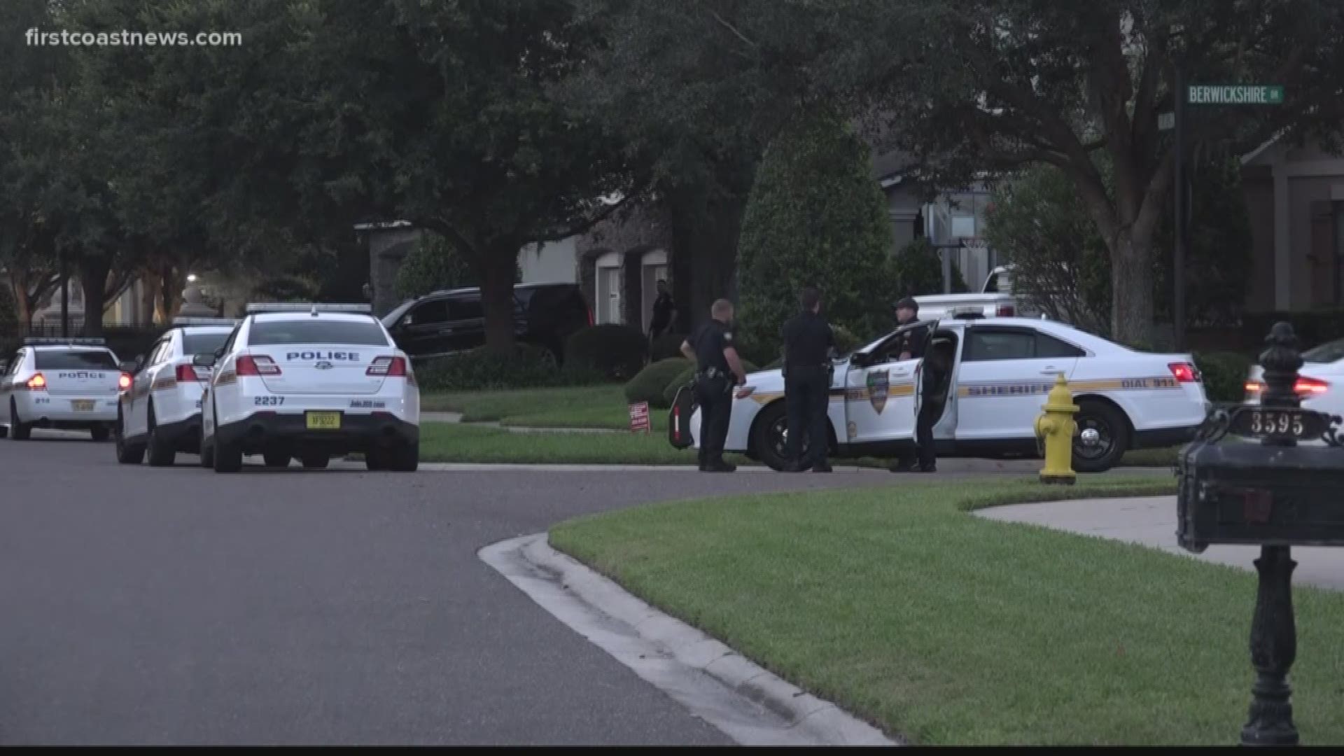 The person taken into custody has not been confirmed to be former UF Gator and Raines High School football player Jabar Gaffney, but multiple neighbors report seeing the man fitting the description of Gaffney being taken into custody.