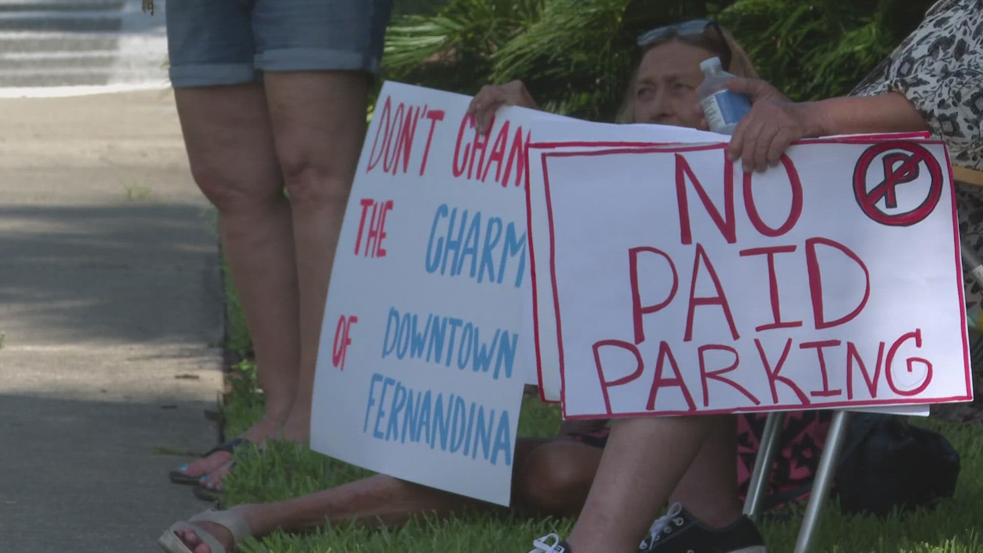 Fernandina Beach residents protest a paid parking plan, saying it could harm the town's charm and businesses.