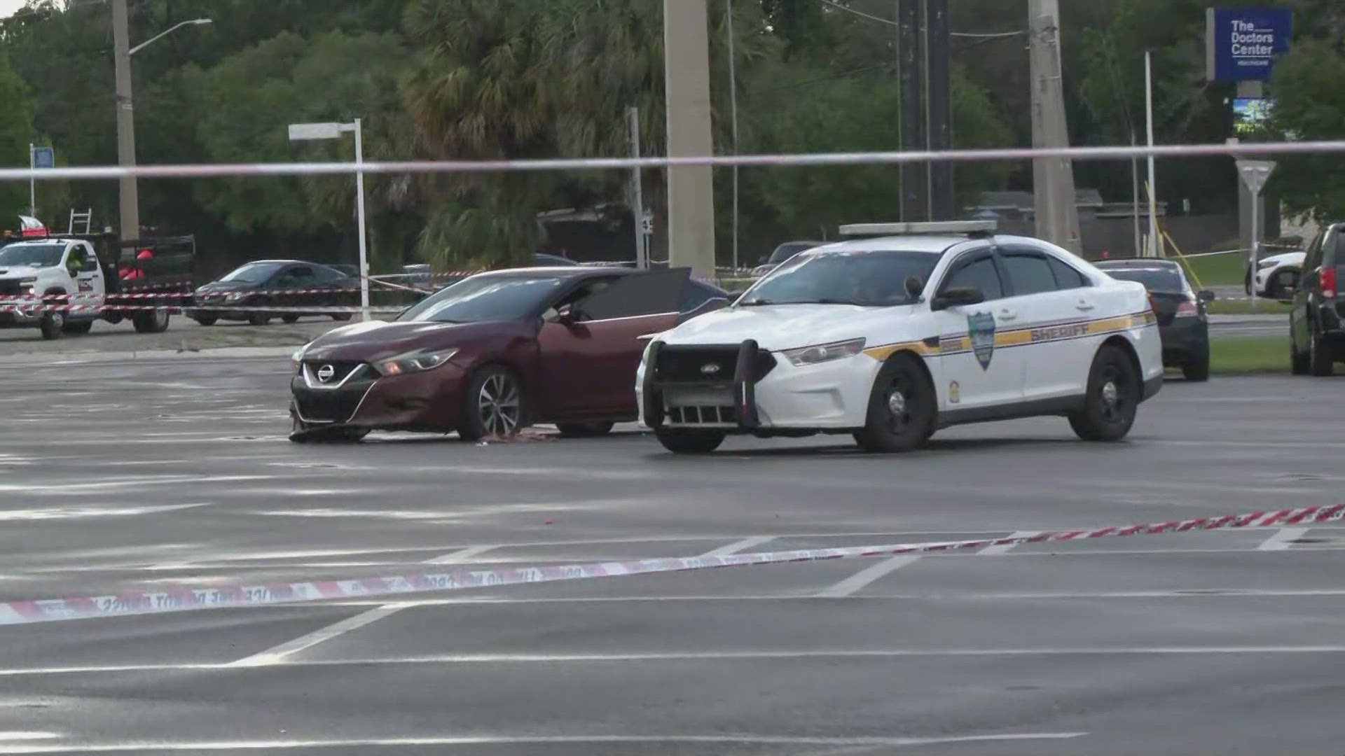 Multiple shooters jumped out of a car and fired at the driver of another vehicle at the intersection of Normandy Boulevard and Lane Avenue, JSO said.