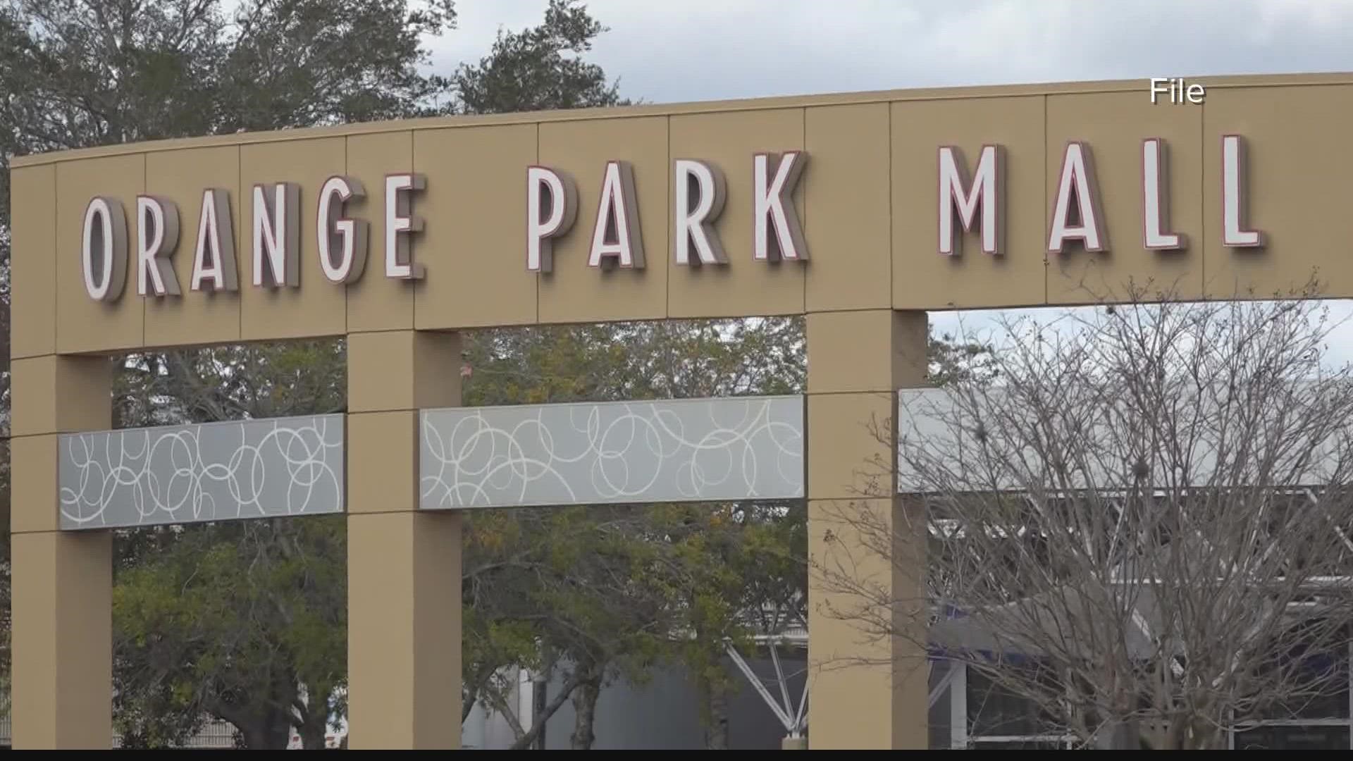 An Orange Park mother said she feared for her and her children's lives as a crowd rushed in to the AMC movie theater, yelling "he has a gun," on Saturday.