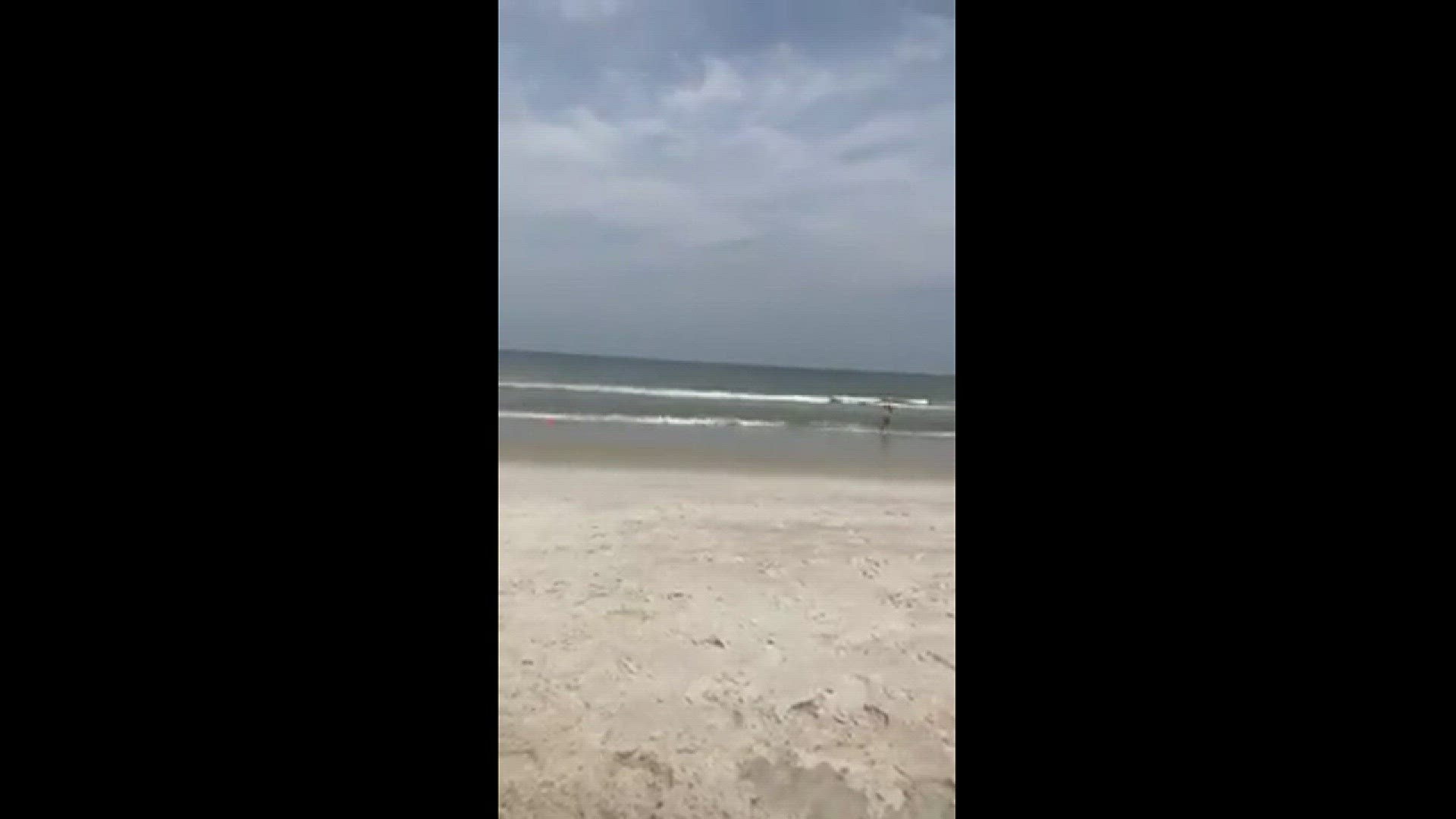 Two people, a 17-year-old boy and a 30-year-old man, were bitten by sharks in Fernandina Beach Friday afternoon. (Video courtesy of ?Danielle Miller)