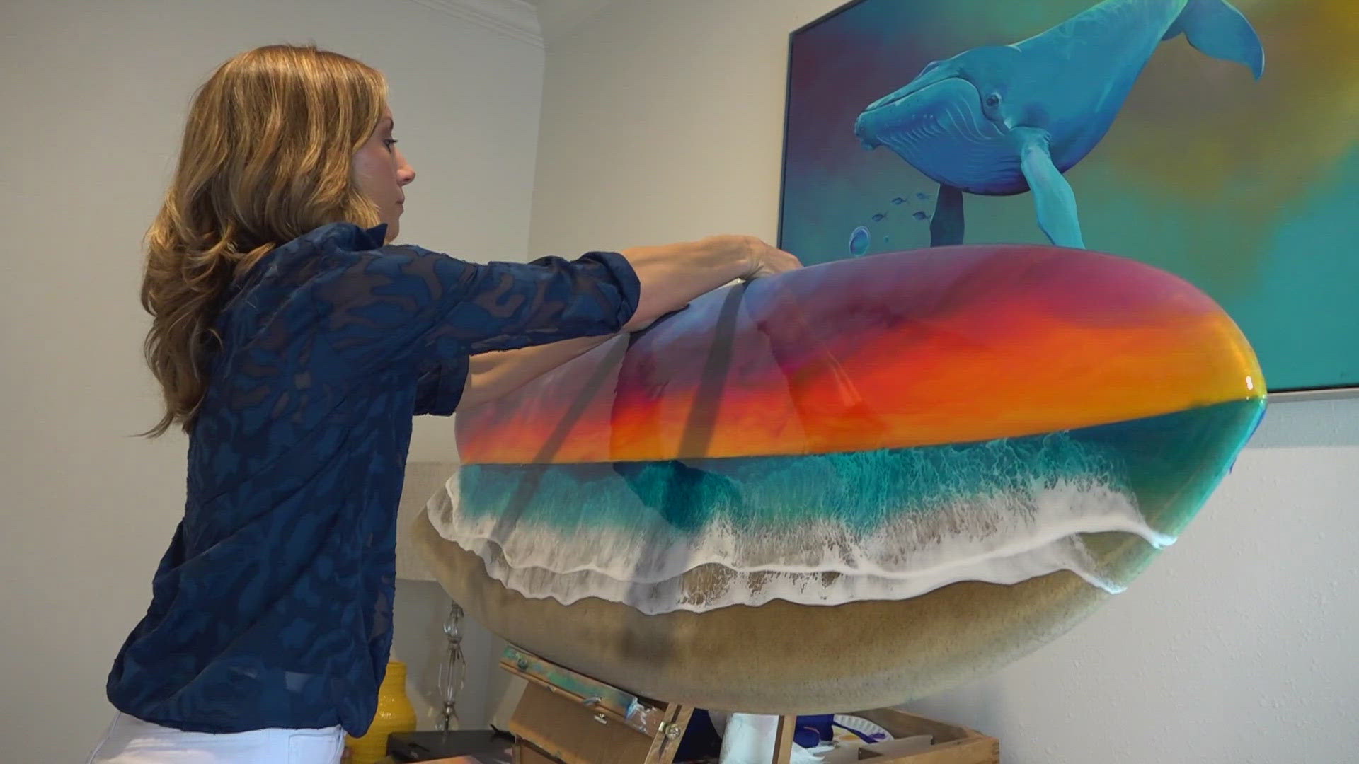 Kirsten Lahmann transforms old, broken surfboards into works of art and coffee tables. It's a hobby she said started growing up with her brother.