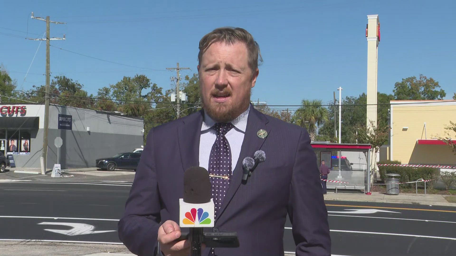 The Jacksonville Sheriff's Office said the shooter began hitting the man after shooting him, before being pulled away and leaving the scene in a dark-colored SUV.