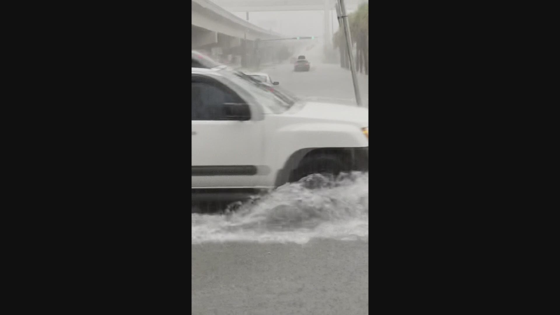 Heavy rain floods roads in San Marco area. Credit: Mark Stetson