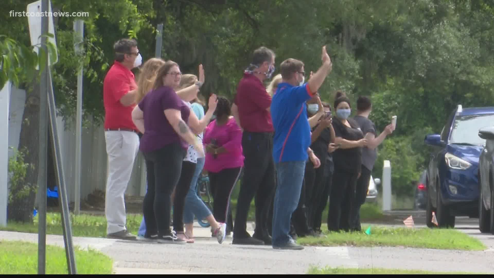 Around 75 vehicles from every first responder and emergency agency in Nassau County paraded around Baptist Medical Center Nassau on Thursday.