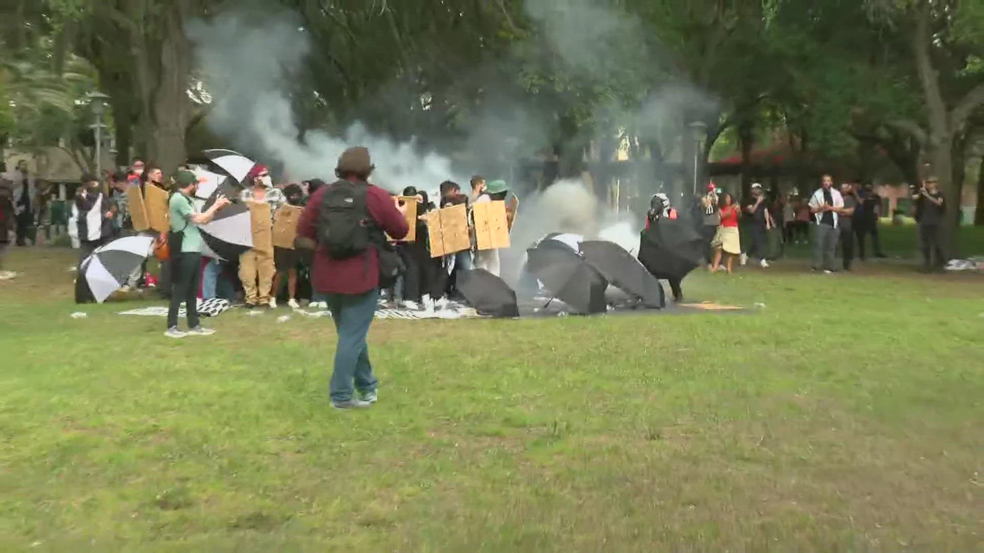 Law enforcement deployed tear gas on the group minutes after telling them to leave the area.