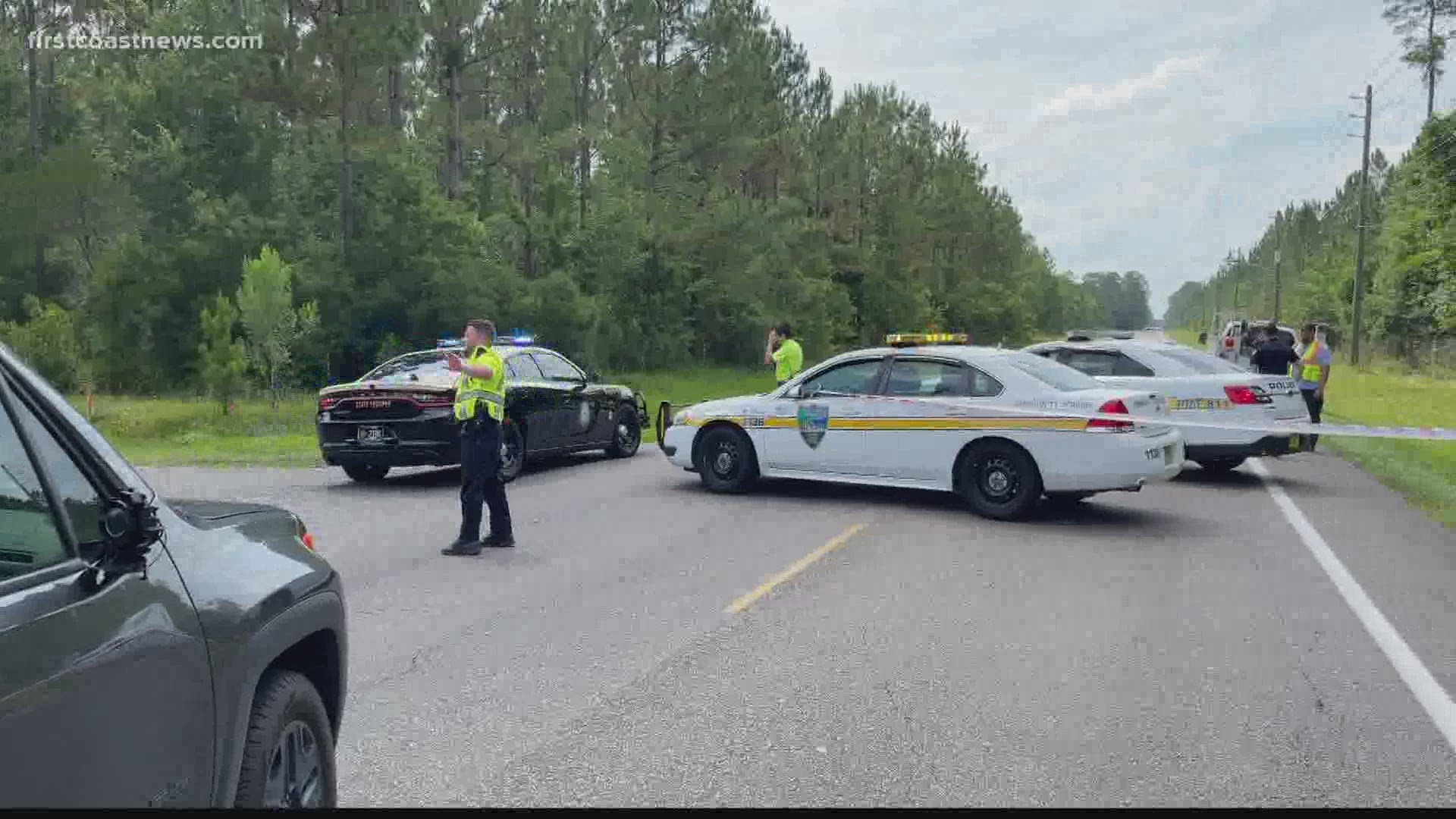 The crash happened on Lem Turner Road around 3 p.m., when a car and motorcycle collided. One person died and several others were taken to the hospital.
