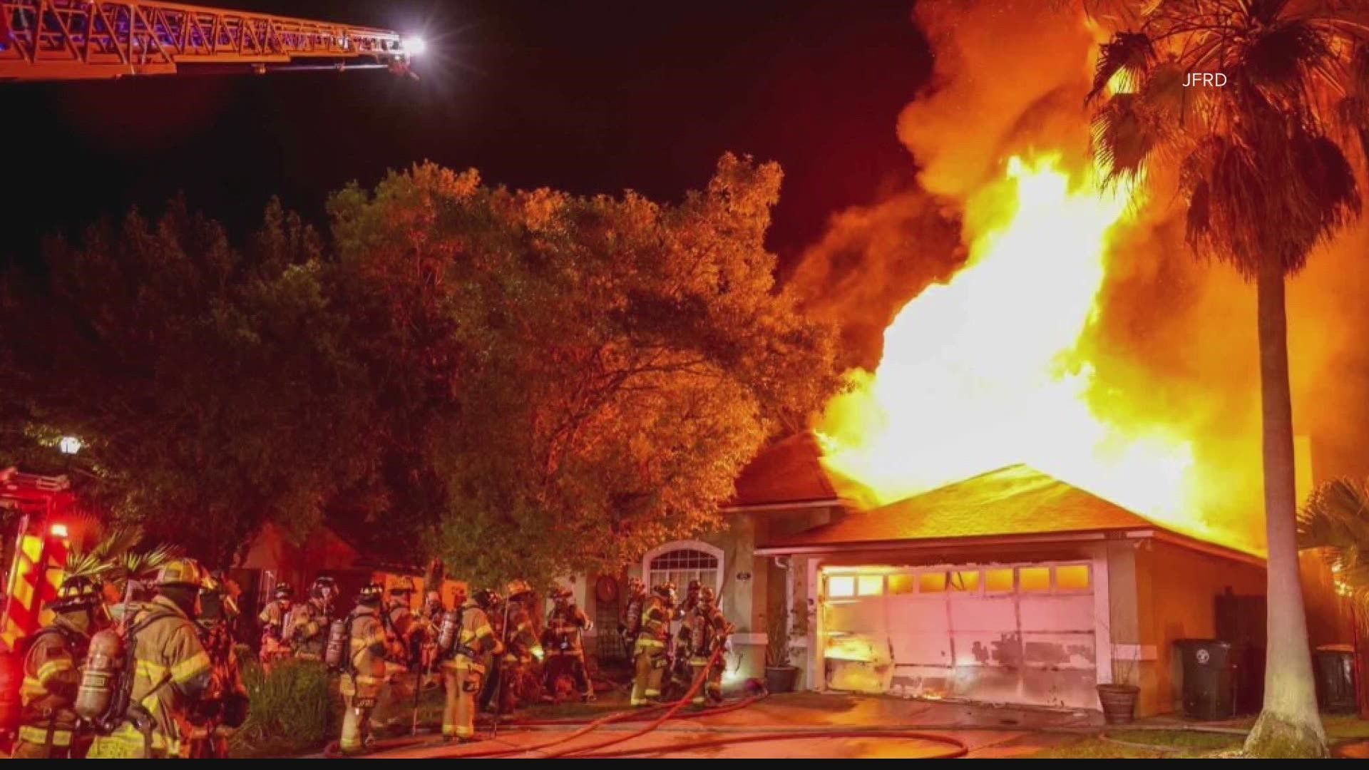 Striking photos show a fire just east of UNF. Two firefighters were injured, but the owner was not home.