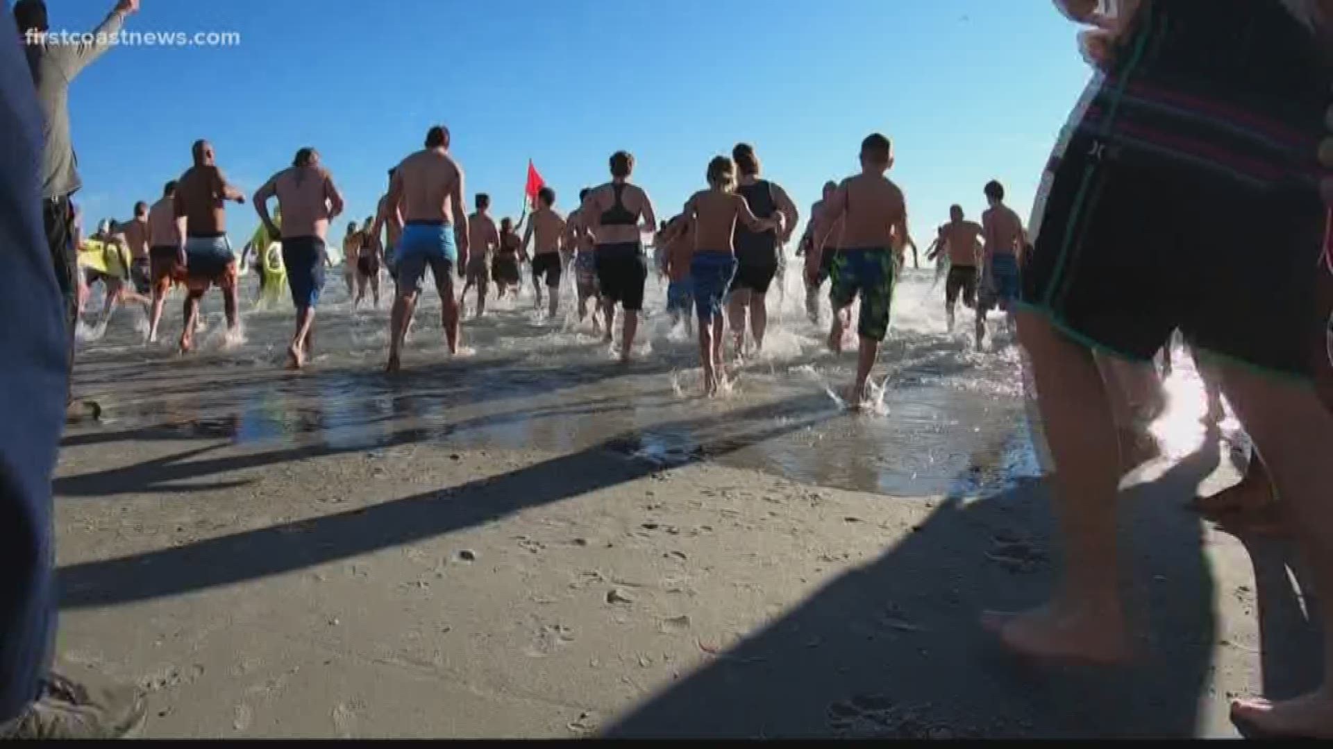 It was a chilly 63 degrees in the Atlantic Ocean as hundreds gathered at Jacksonville Beach to participate in the 31st Annual Polar Plunge.