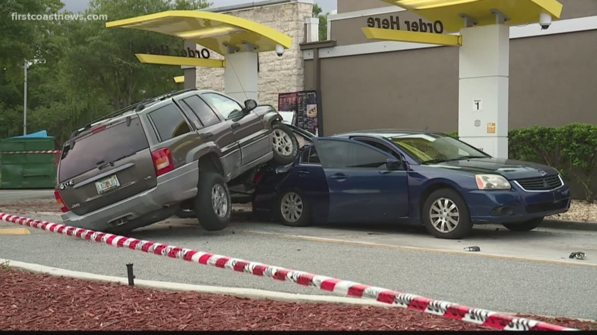 A vehicle crashed into two cars at a McDonald's drive-thru at Fort Caroline Sunday evening.