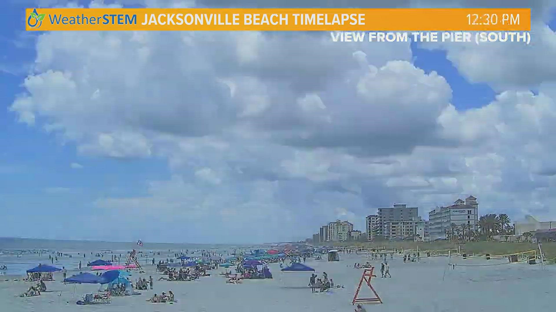 This timelapse shows the moment a busy Jacksonville beach cleared out in a matter of moments as a strong thunderstorm pushed towards the coast Sunday afternoon.