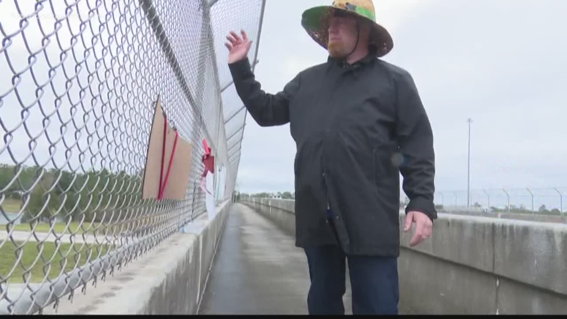 If you’ve been on Interstate 95 near Greenland Road then you may have seen a few signs hanging from the bridge.