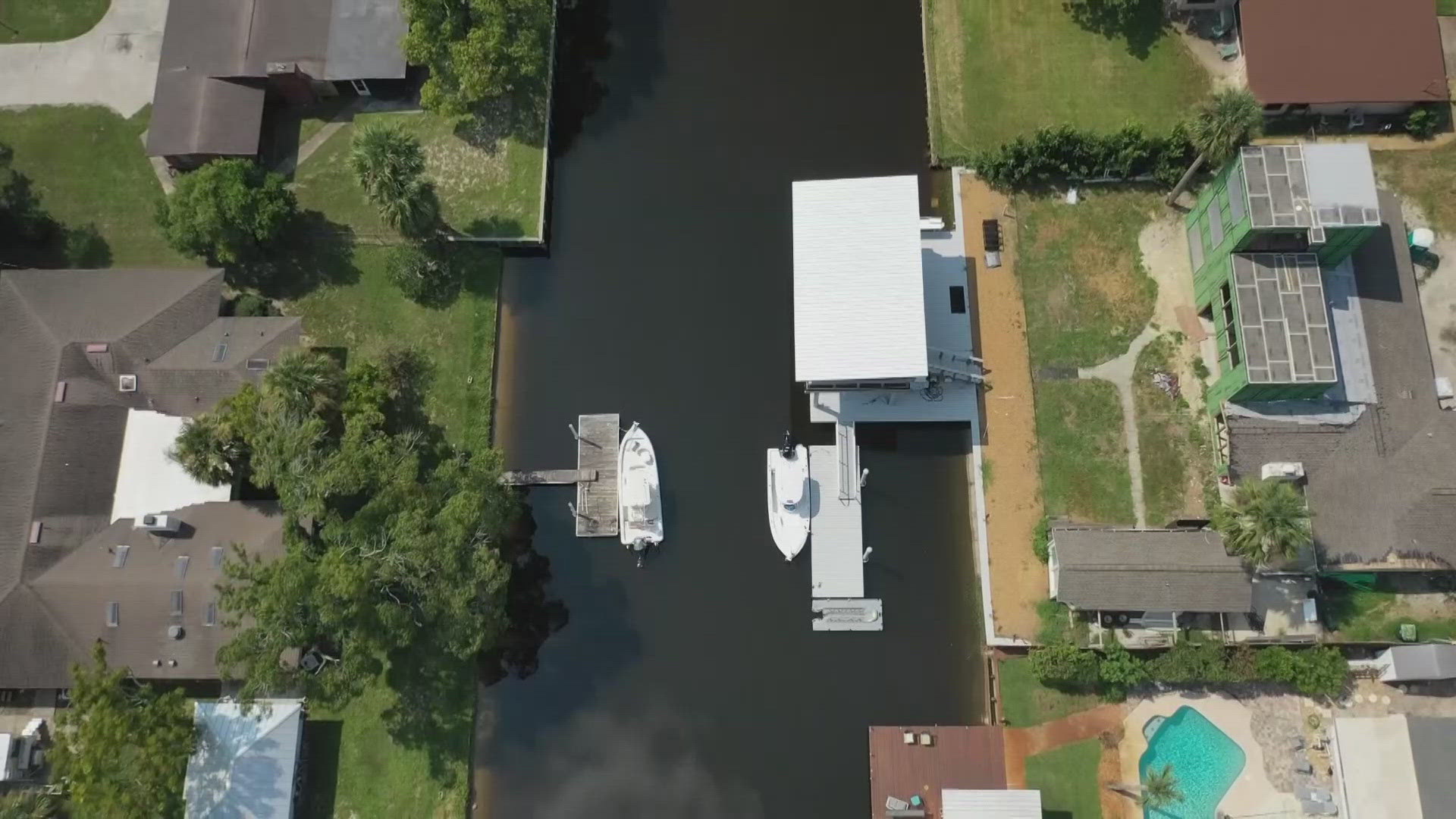 Residents argue docks extending deep into the canal narrows navigation, poses safety hazards and sets a precedent for other homeowners to push far into waterways