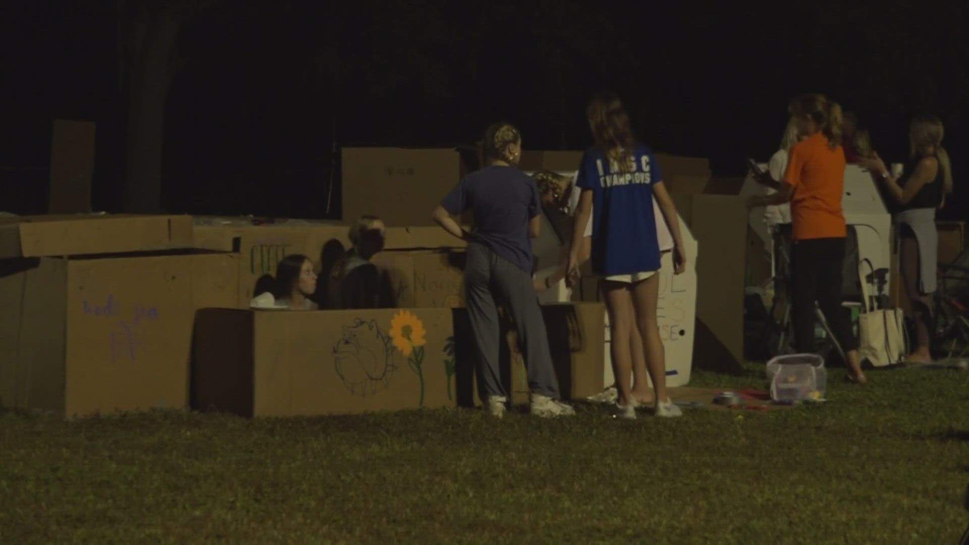 Dozens of people are spending the night on the lawn in tents or cardboard boxes Friday night at Lakewood Church in Jacksonville.