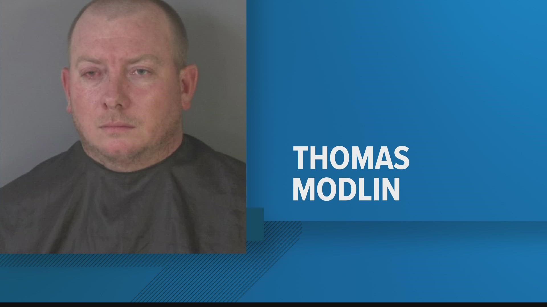Thomas Modlin, 32, was charged with one count of second-degree murder and another count of attempted murder, according to jail records.