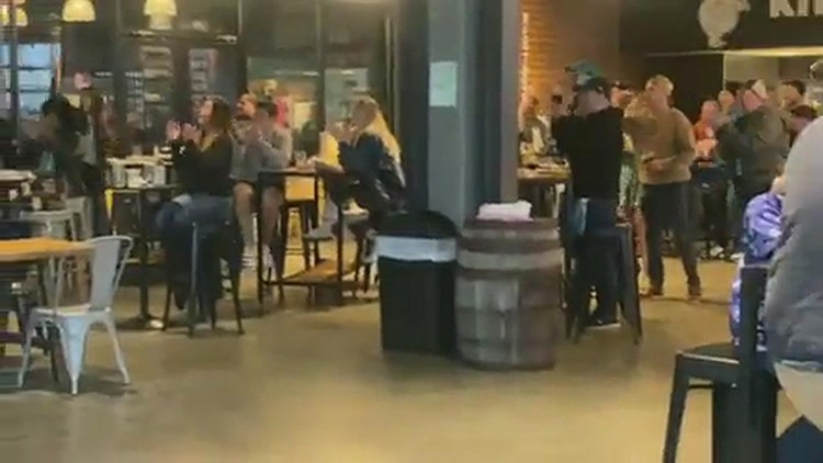 Jaguars fans at Intuition Ale Works cheering Jaguars touchdown