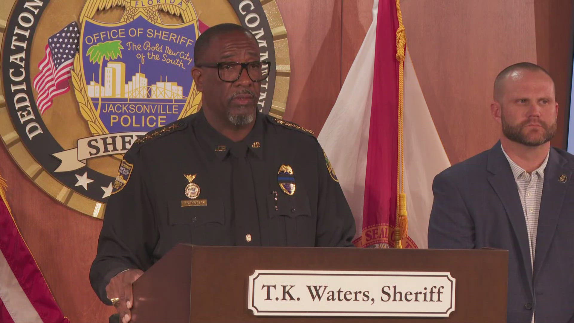 Sheriff T.K. Waters said the now-former officer's sister was arrested as well and that there are 7 arrest warrants out for other individuals "criminally involved."