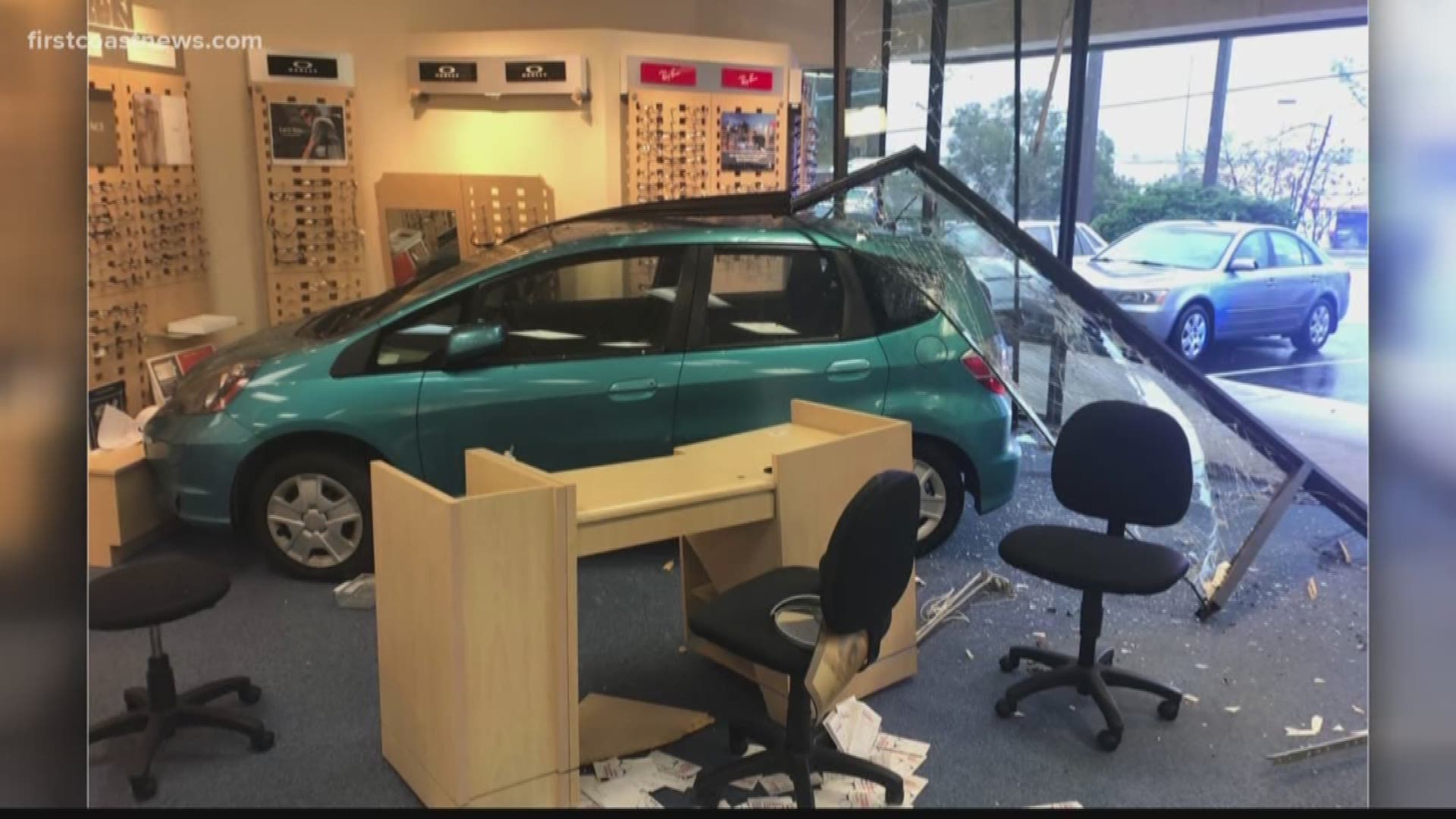 An elderly woman was rushed to a hospital after crashing a vehicle into a LensCrafters near Orange Park Mall.