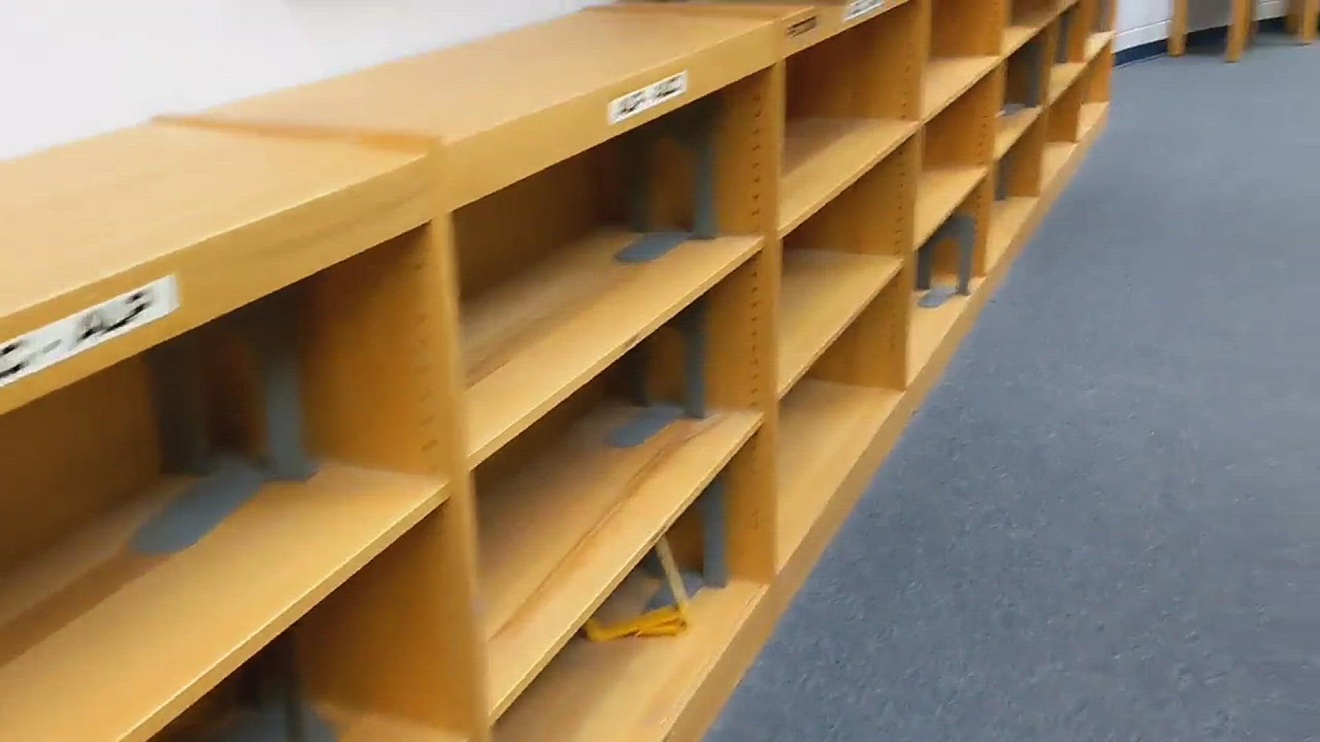 Brian Covey said bookshelves were emptied at his children's school last week. DCPS is reviewing books to ensure they fall in line with new state law passed in July.