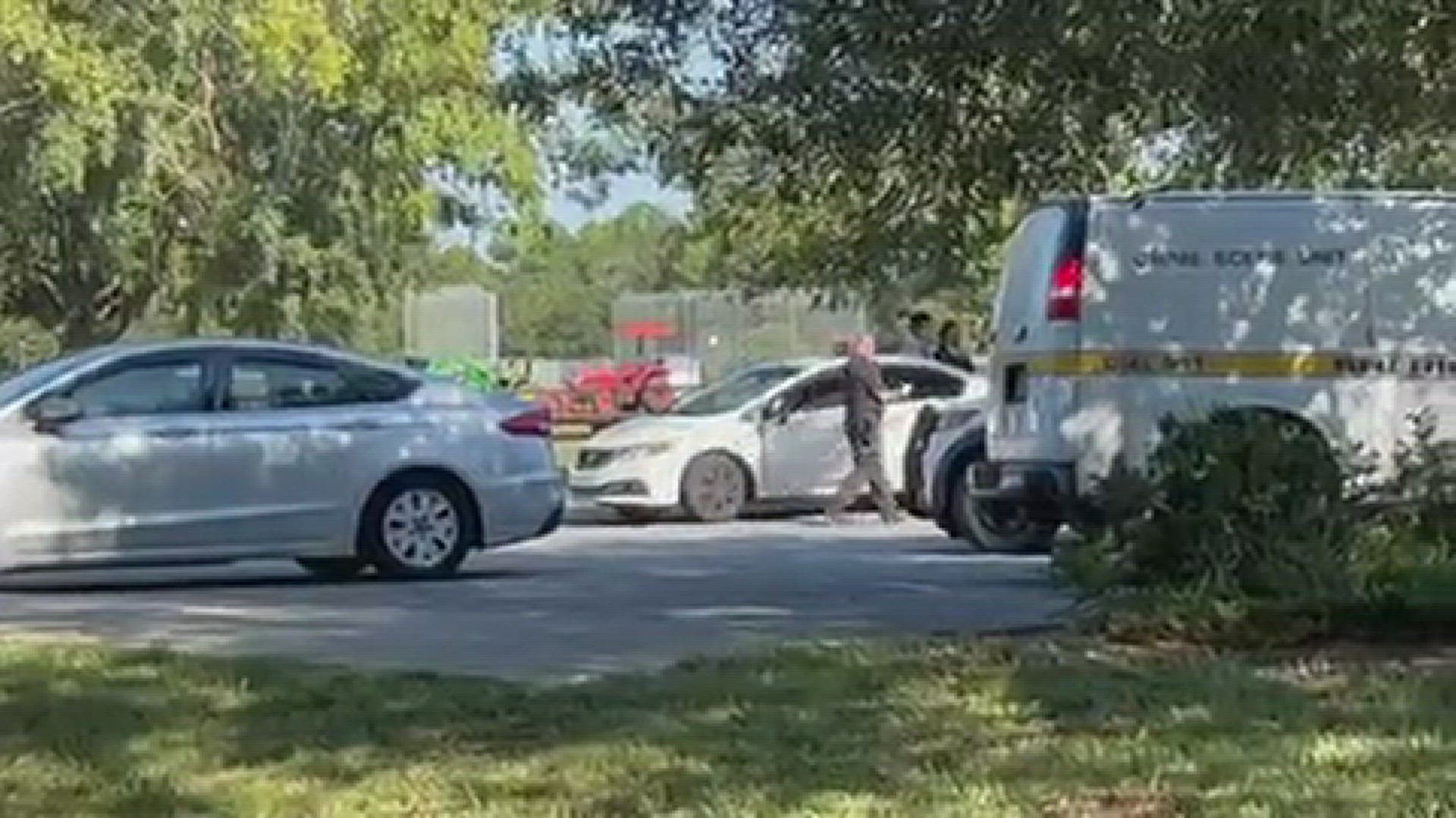 The Jacksonville Sheriff's Office says a woman was found dead with gunshot wounds inside of a vehicle at Our Community Club Park Thursday morning.
Credit: Joe Massa