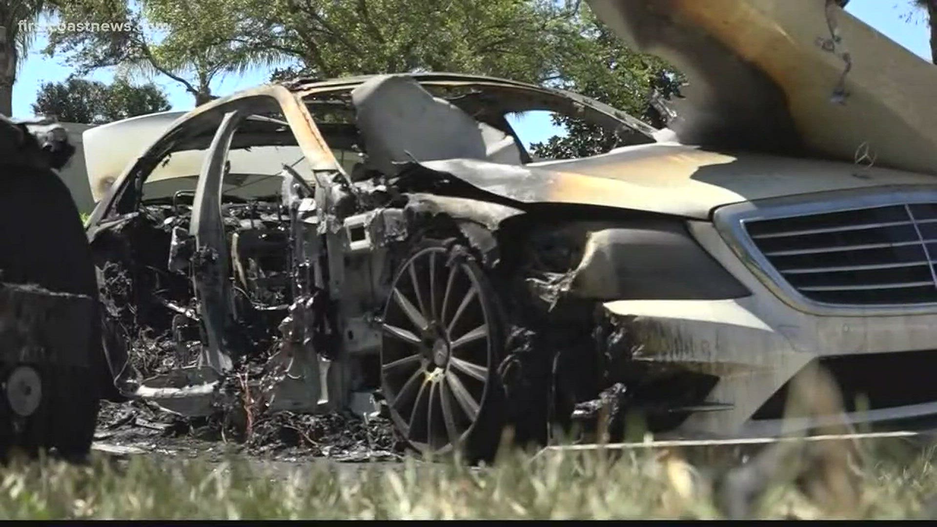 Two luxury cars were torched overnight.
