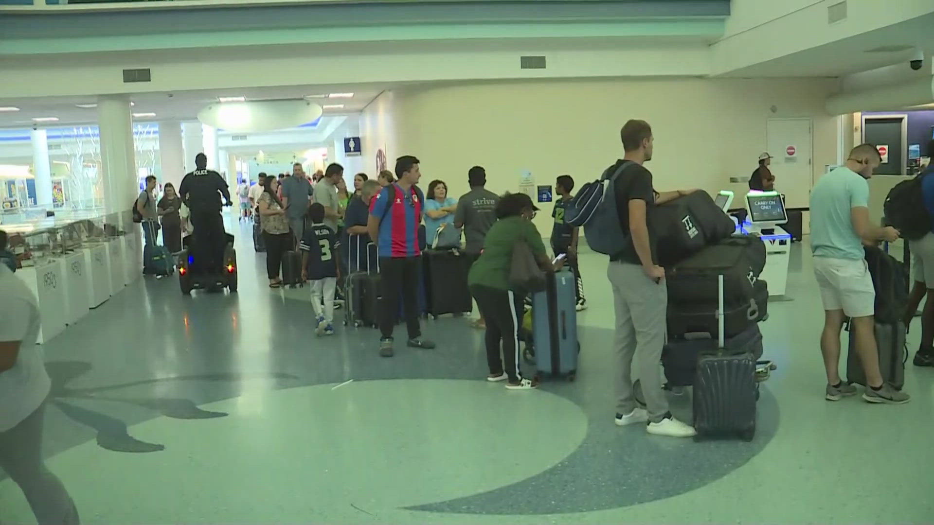 Jacksonville International Airport was packed Friday with people waiting on delayed flights.