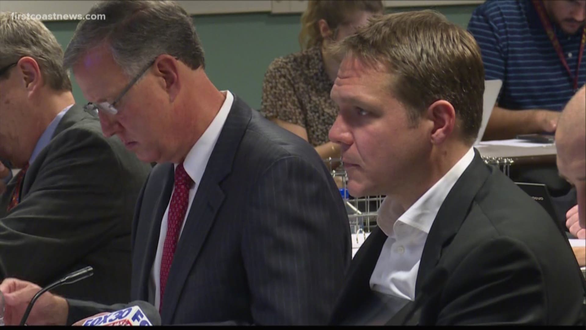 Mayor Lenny Curry announced the board members' resignations, which are effective at the end of February.