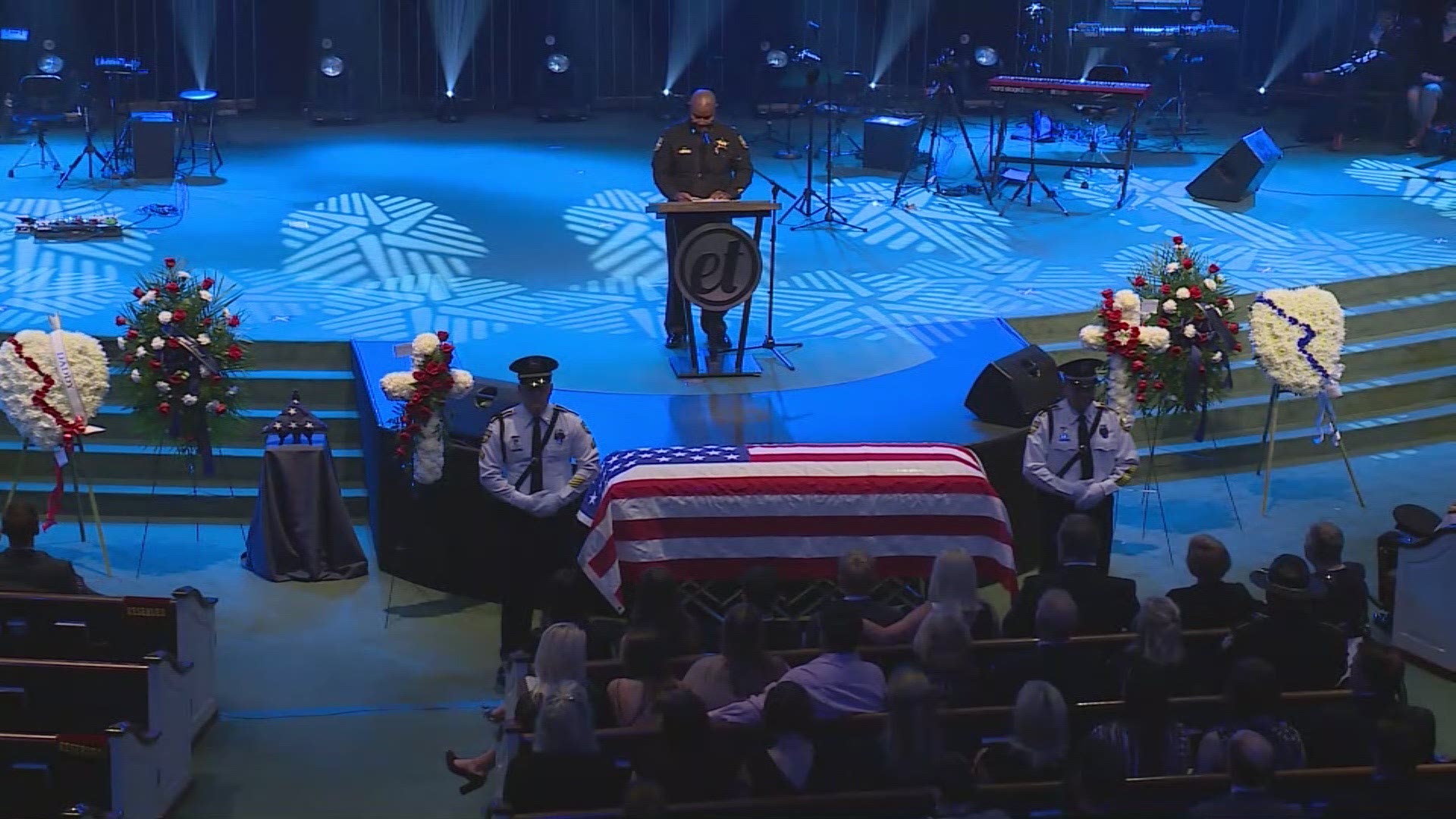 Fellow officer recited scriptures and 'Amazing Grace' was performed at Lance Whitaker's funeral Wednesday.
