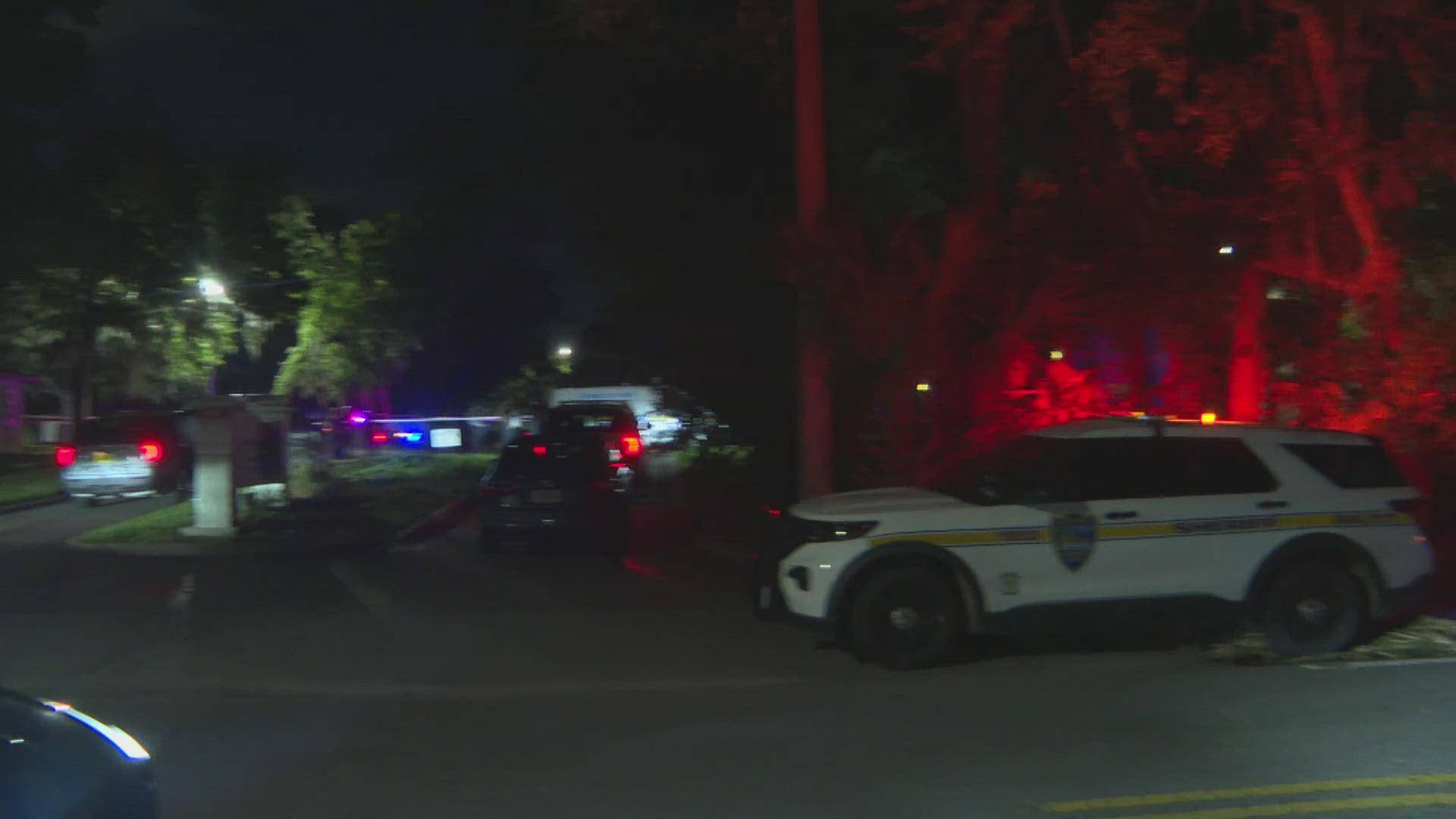 The man was shot in the apartment complex parking lot and ran into an apartment. The residents called 911, police said. He was later pronounced dead at the scene.