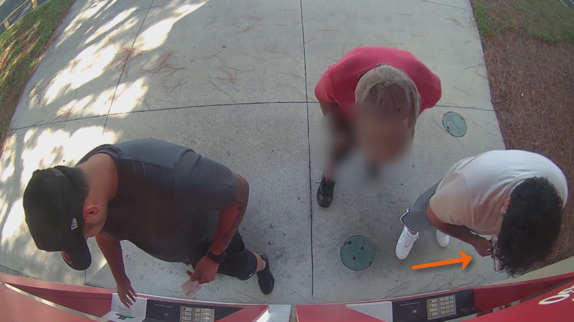 Police say a group of men jammed an ATM with coins and then offered customers help, where they then switched out their credit card with a stolen one.