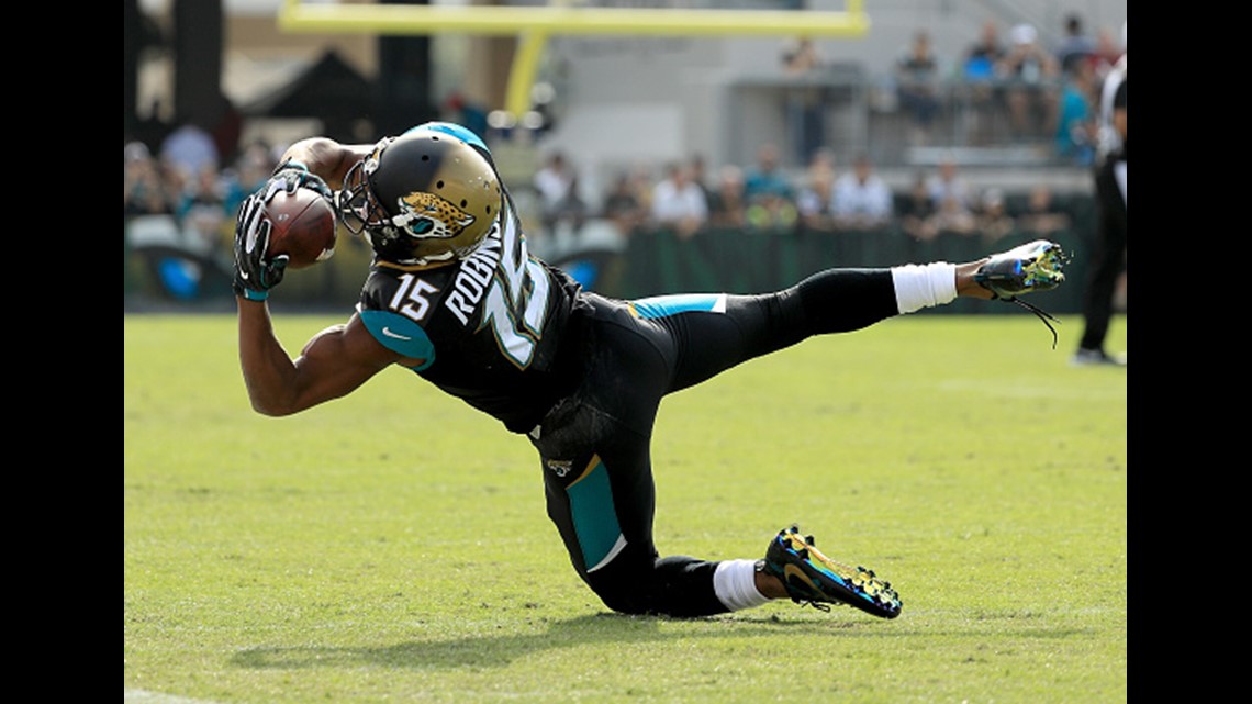 Keenan McCardell of the Jacksonville Jaguars carries the ball during  News Photo - Getty Images