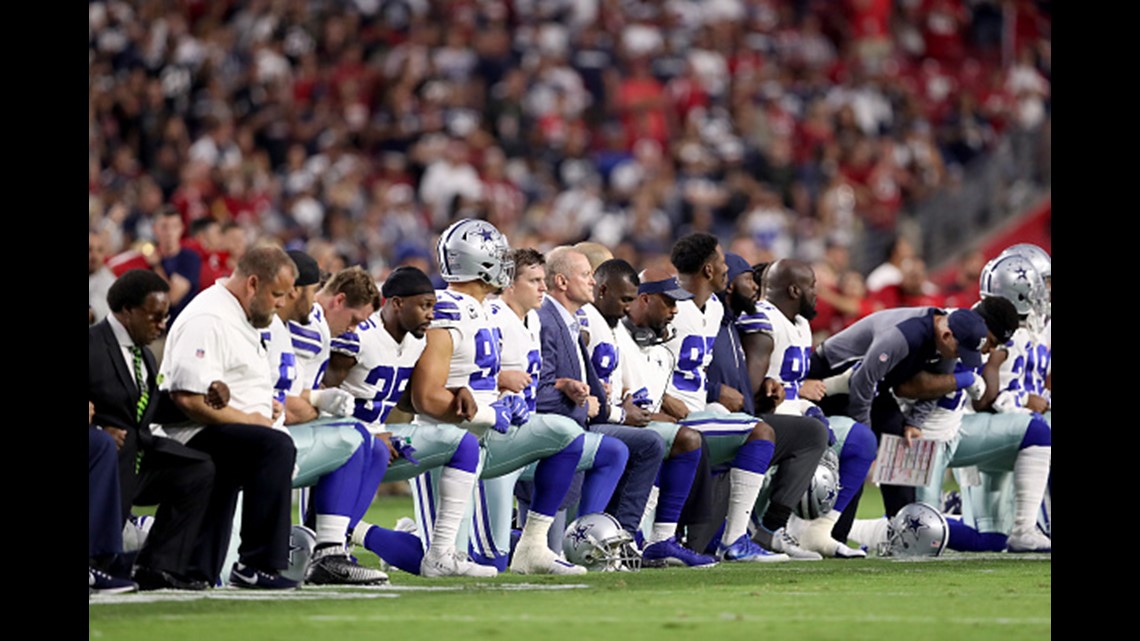 PHOTOS NFL players take a knee
