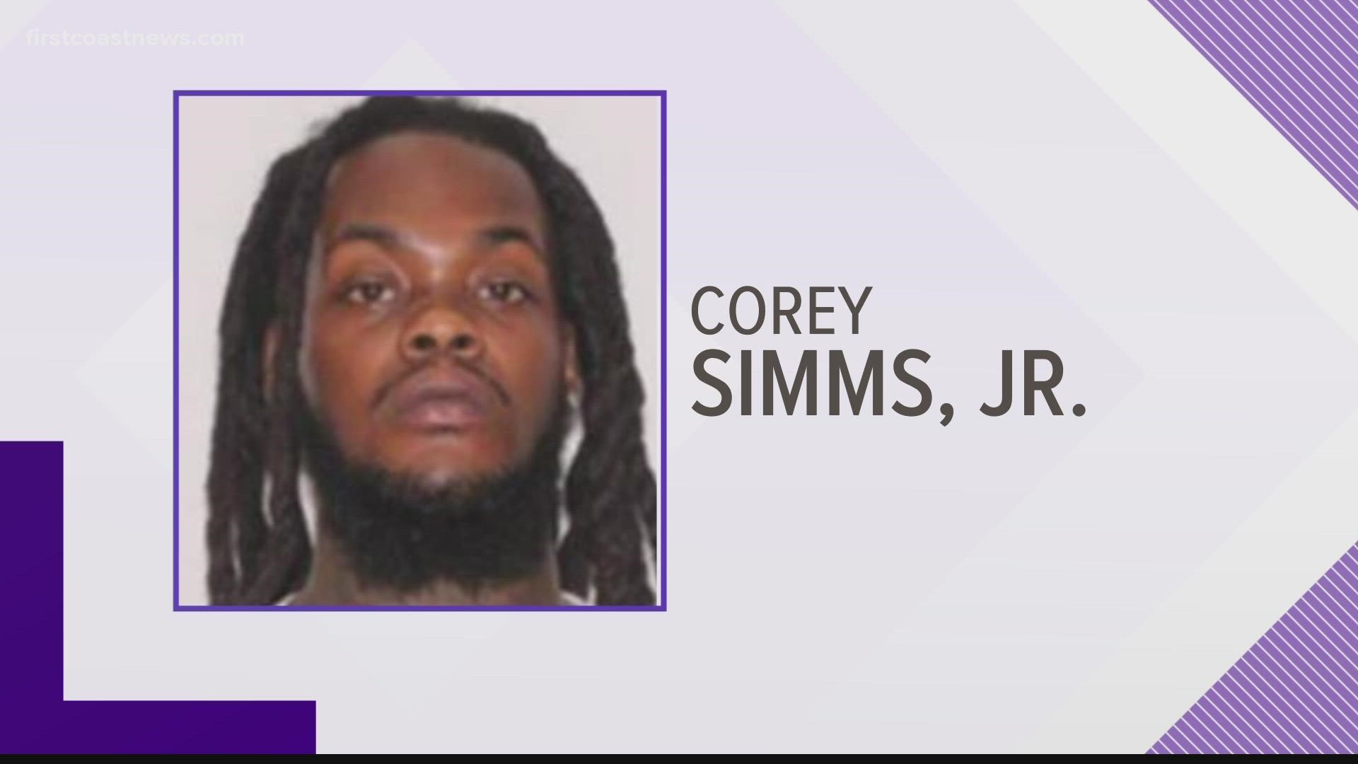 Corey Simms is charged with accessory after the fact in regards to the shooting. A second subject remains at-large.