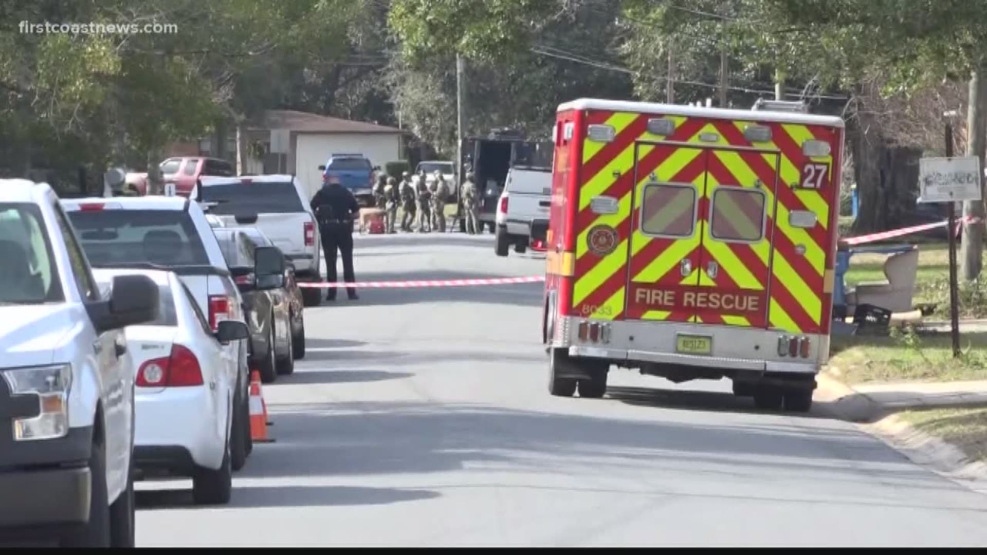 At around 11 a.m., Police and SWAT surrounded a home along Shady Oaks Drive in Arlington Manor in search for a man with an active warrant.