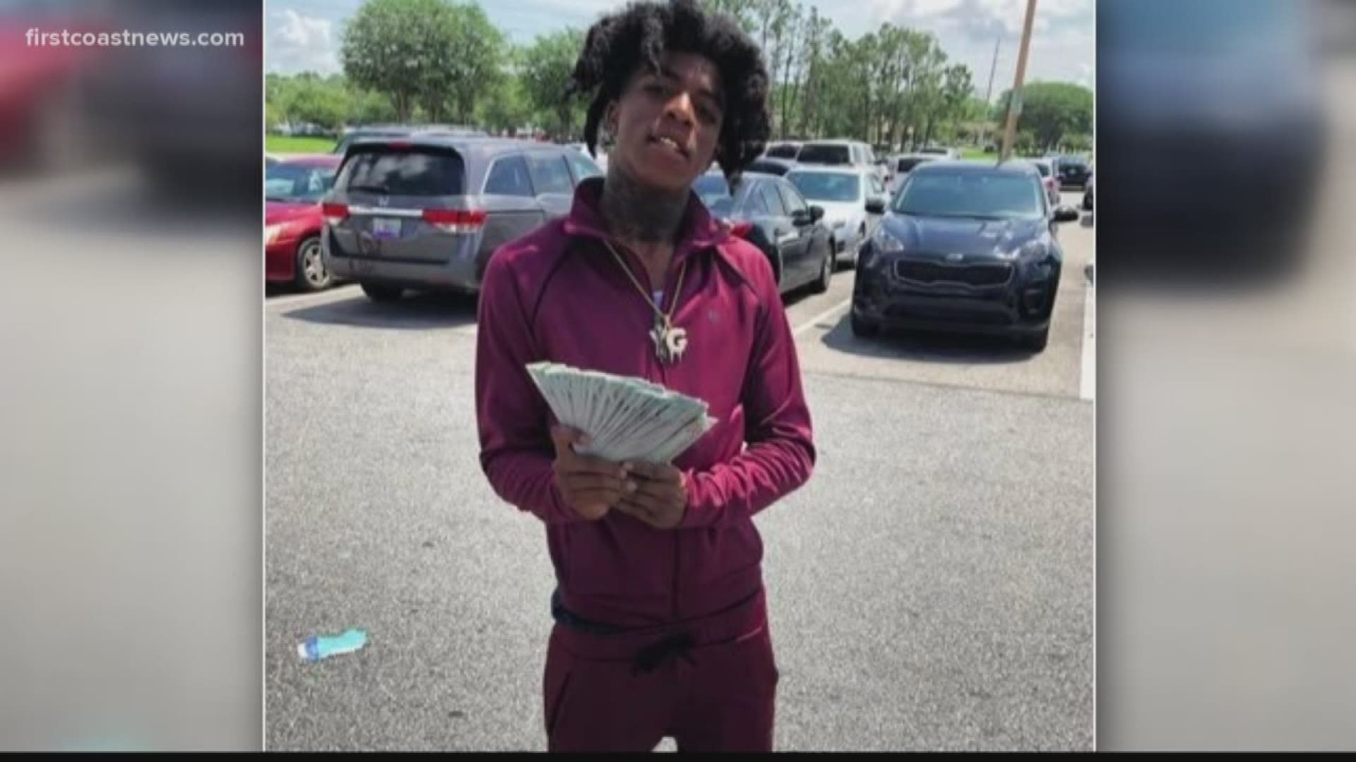 A Jacksonville rapper has been arrested for violating his probation after he reportedly held a gun at a gun shop prior to a fatal shooting near the Town Center.